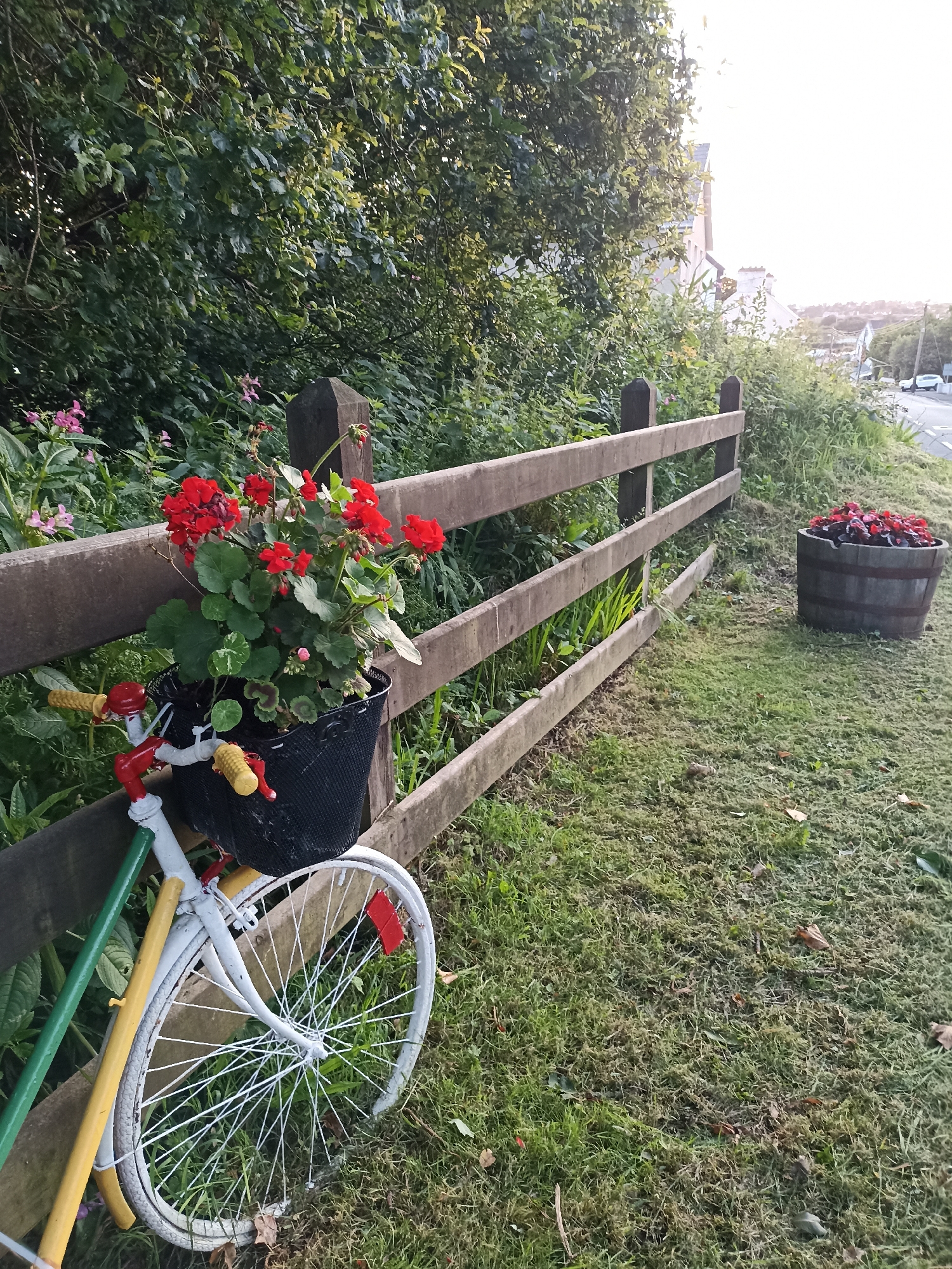 Annagry at dusk: gardens, coastal flats, and a soft summer sunset
