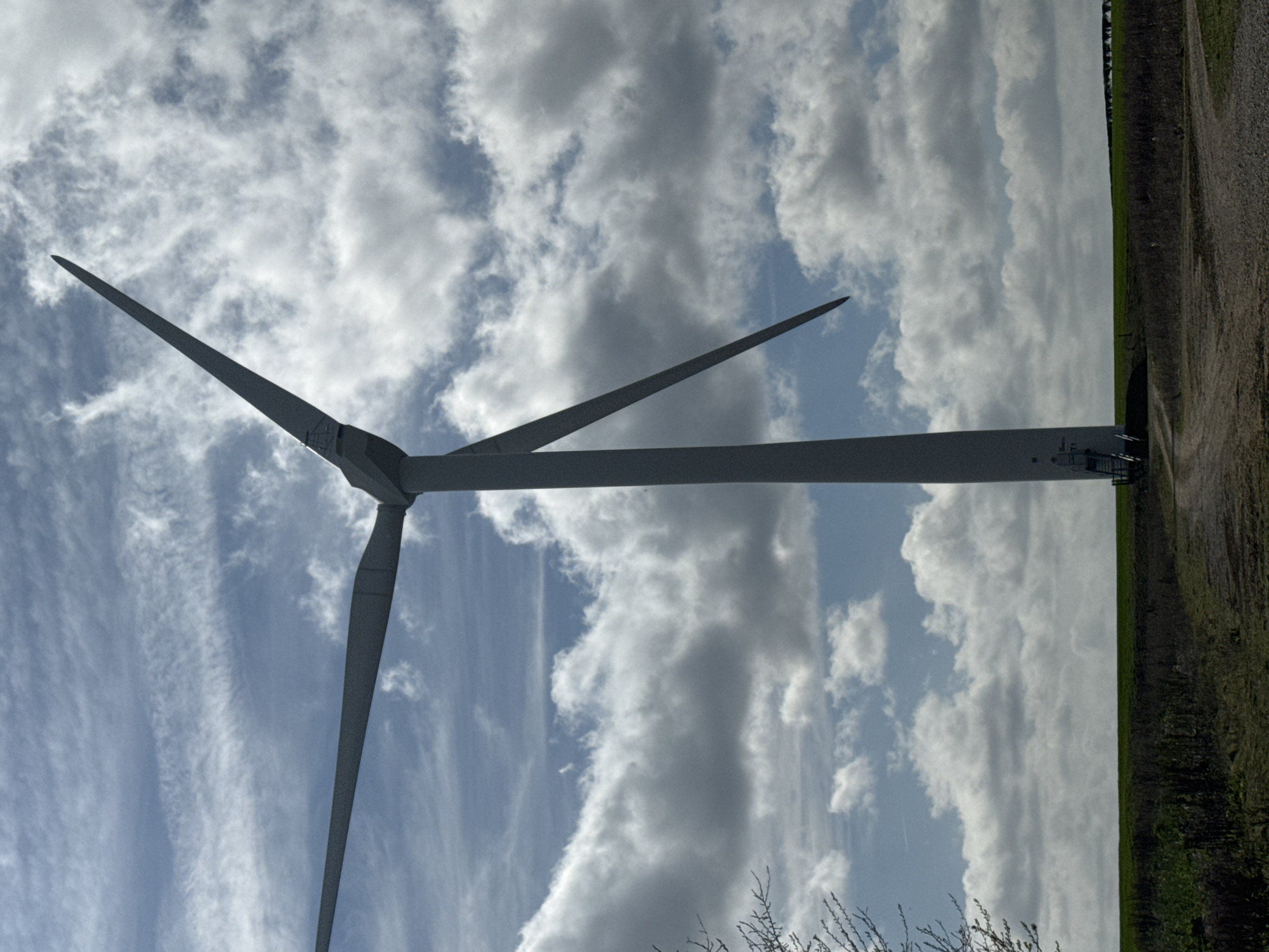 Wind turbine photographed from multiple angles in Rushton countryside
