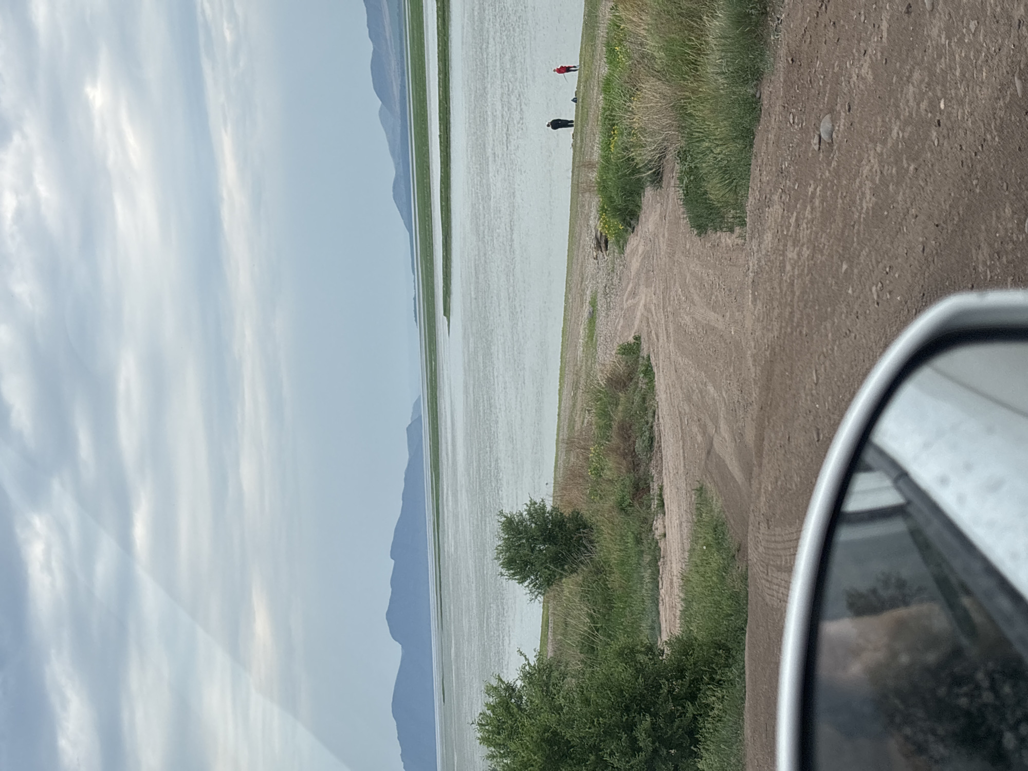 Rural Ust-Abakan landscape documented under cloudy June skies