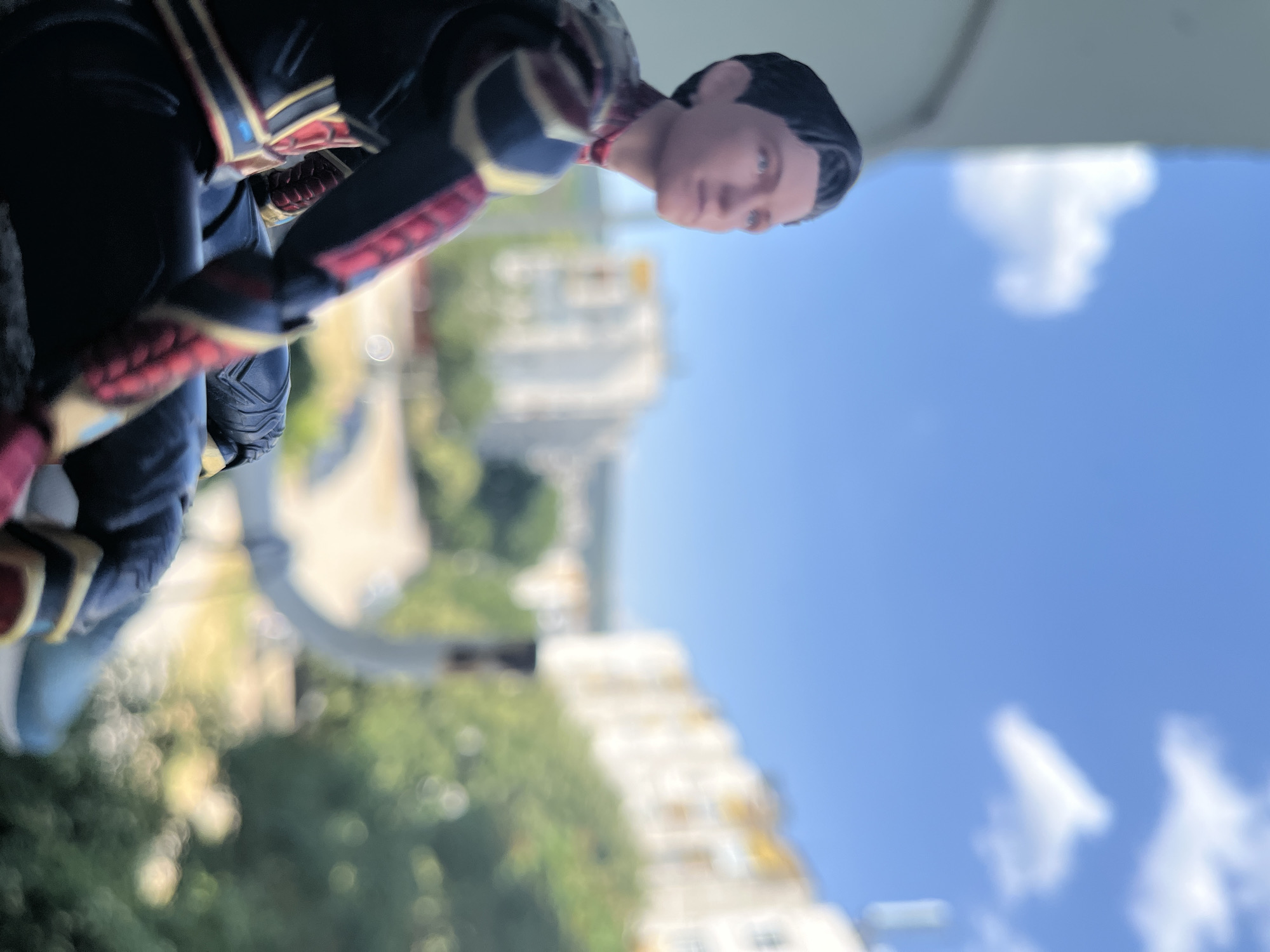 Spider-Man figures posed around Shumen in a casual photo session