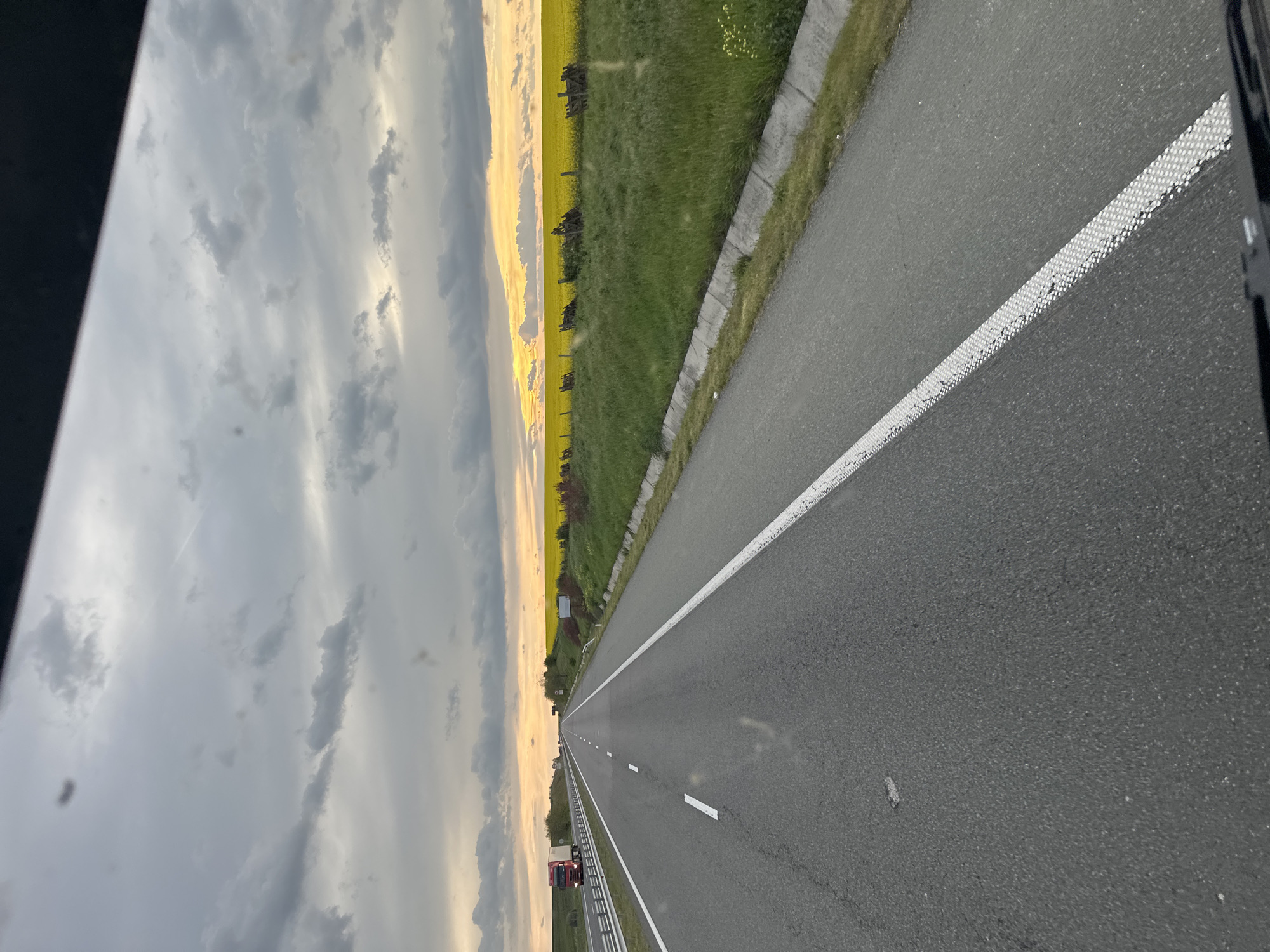 Highway scene with yellow flowers captured in Zheleznik, Bulgaria
