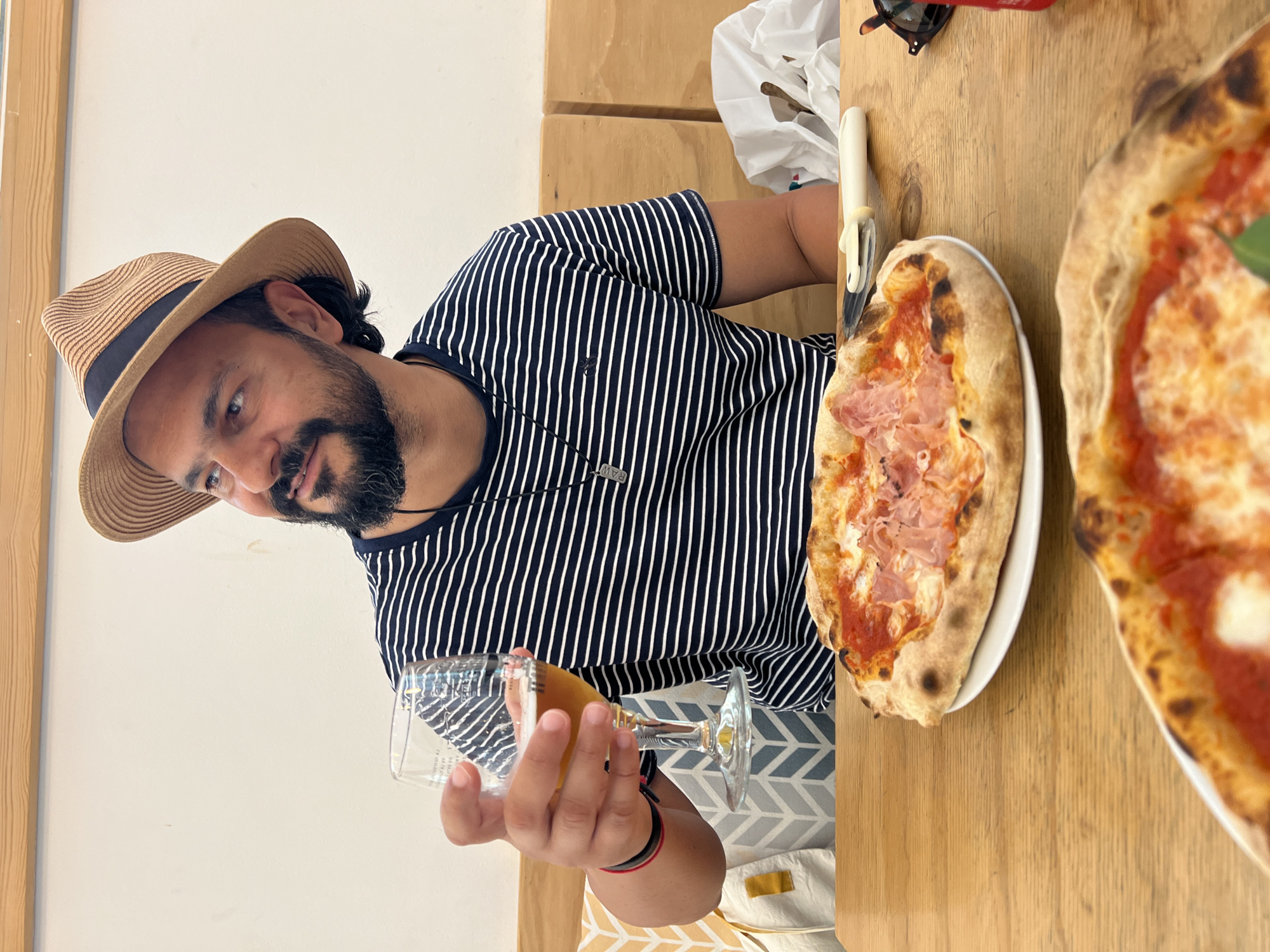 Pizza lunch at a Barcelona restaurant, summer afternoon.