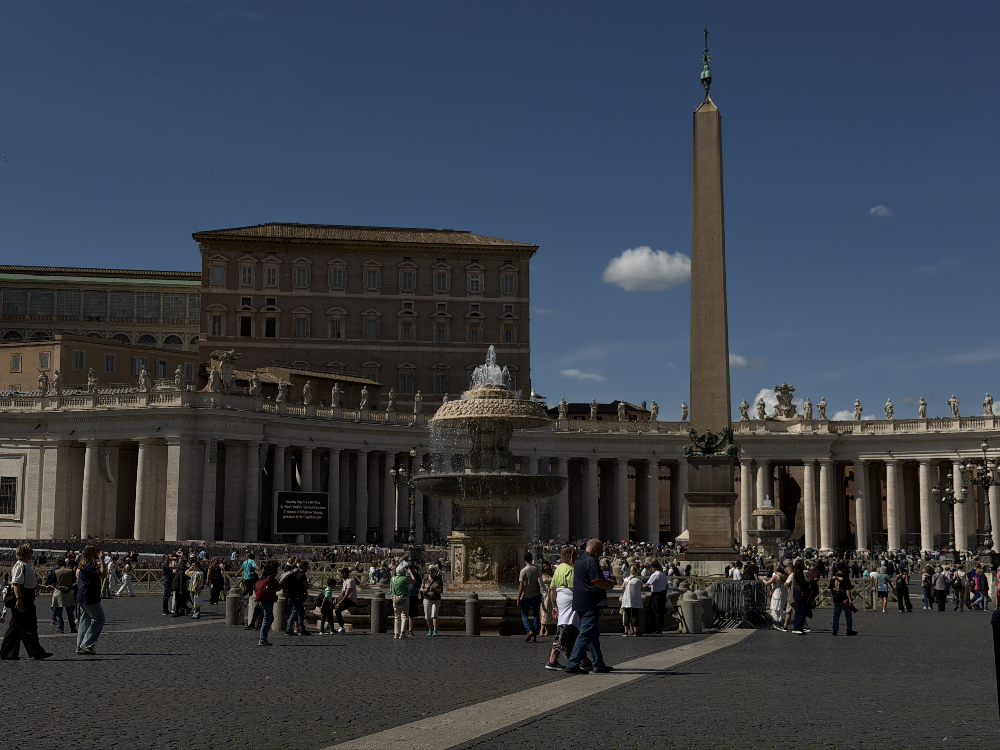 Tourists visit St. Peter's Square on busy Vatican afternoon