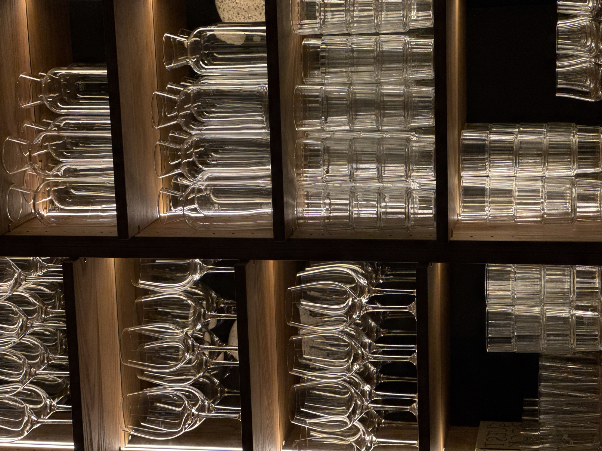 Glassware shelves documented at Vienna commercial establishment