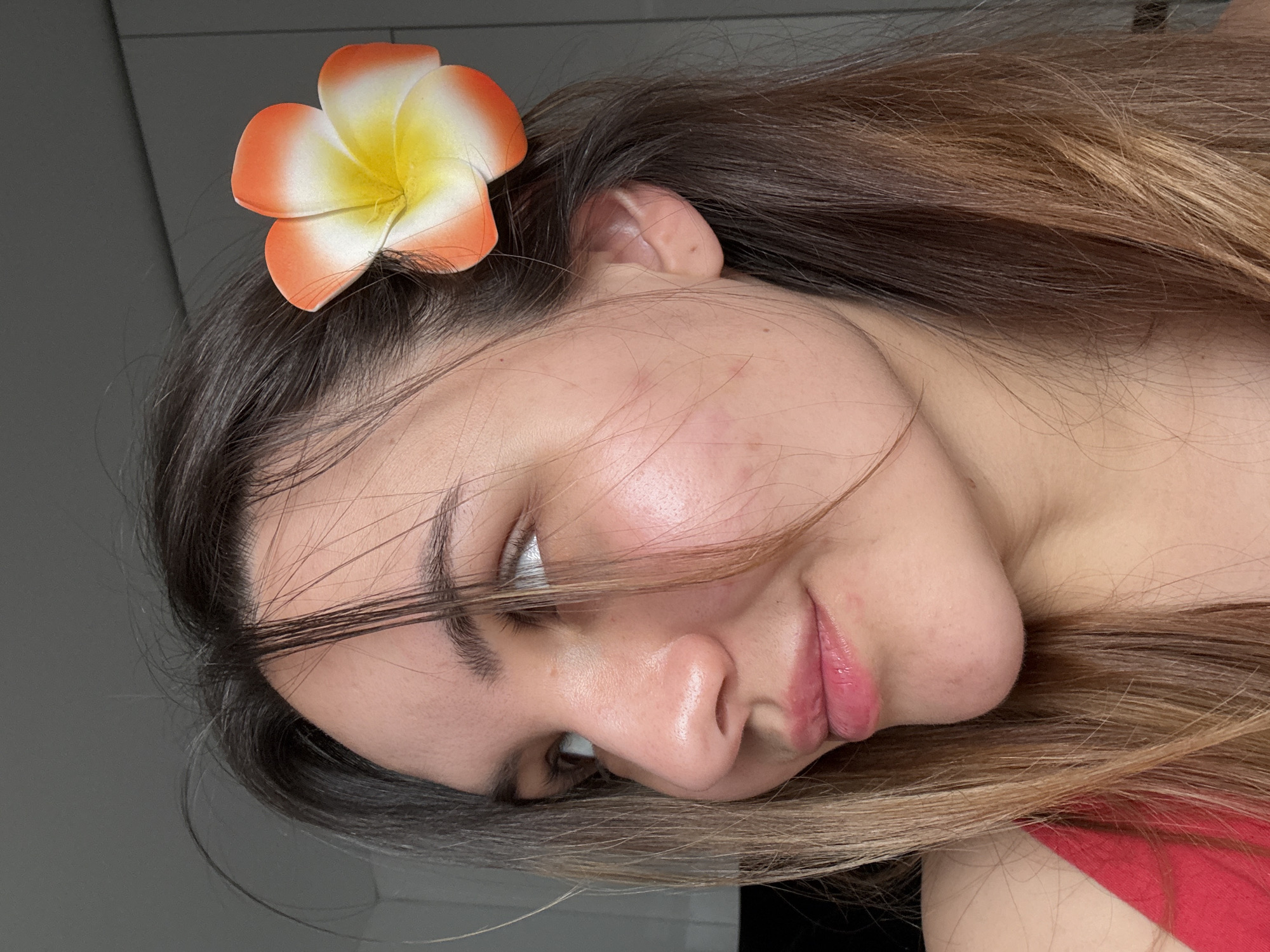 Woman poses with flower hair accessory in Sofia