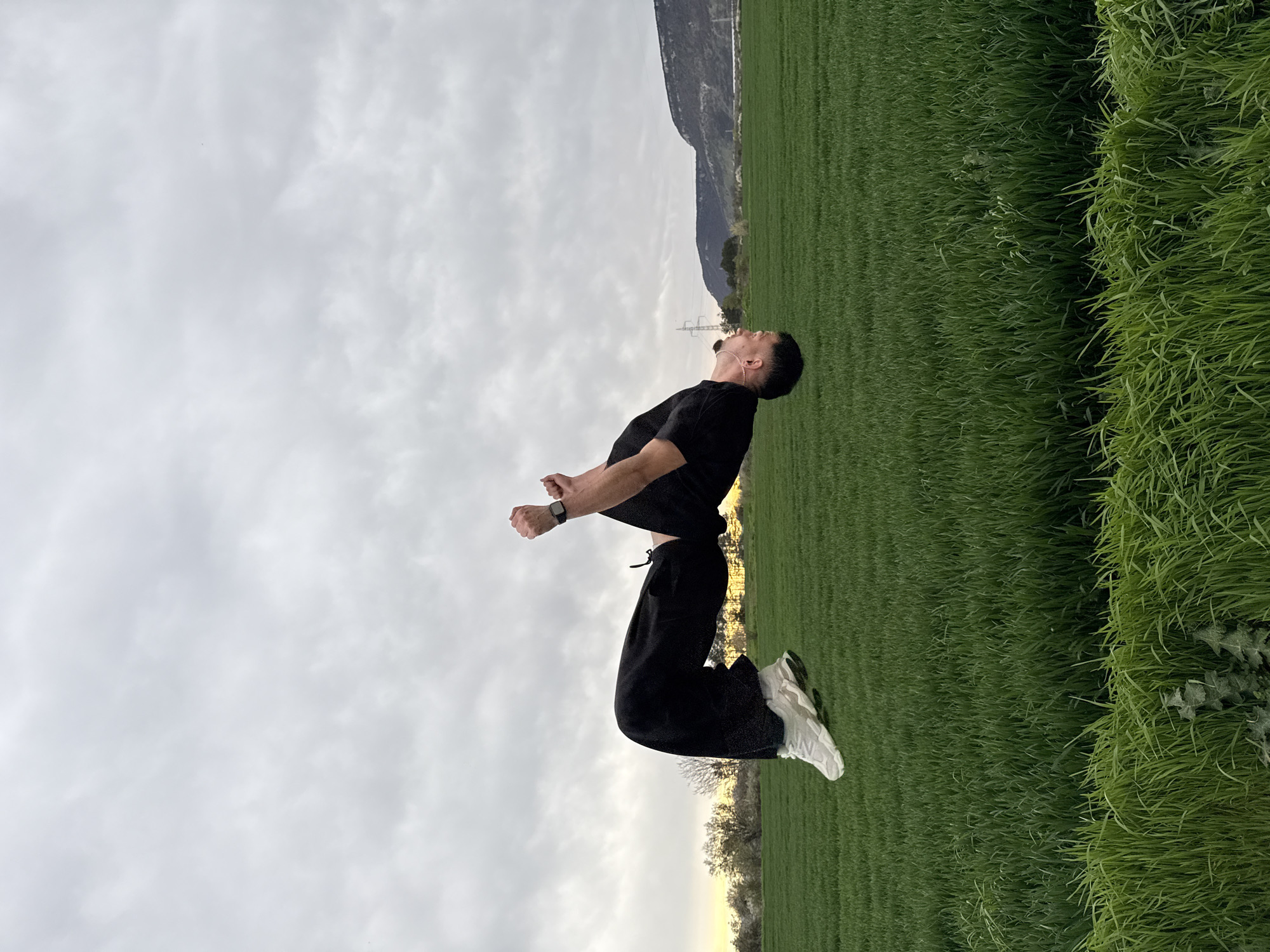 Man performs acrobatic jumps in Bulgarian field