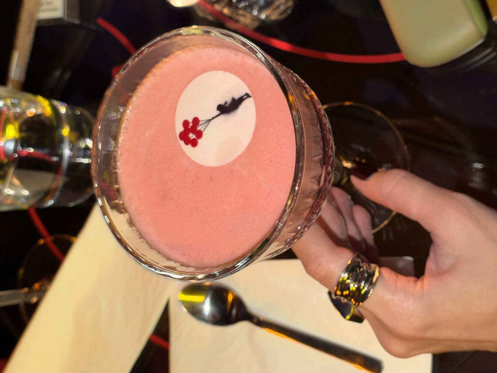 Upscale cocktail bar experience documented in Belgrade during rainy evening