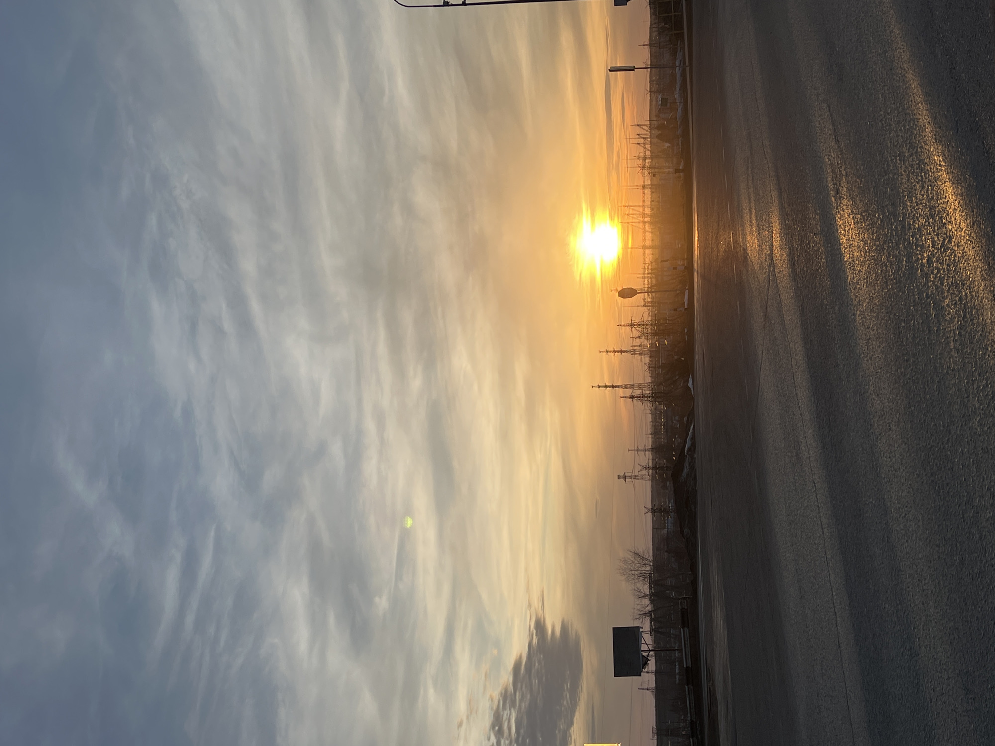 Sunset captured over industrial landscape in Chaikovsky, Russia