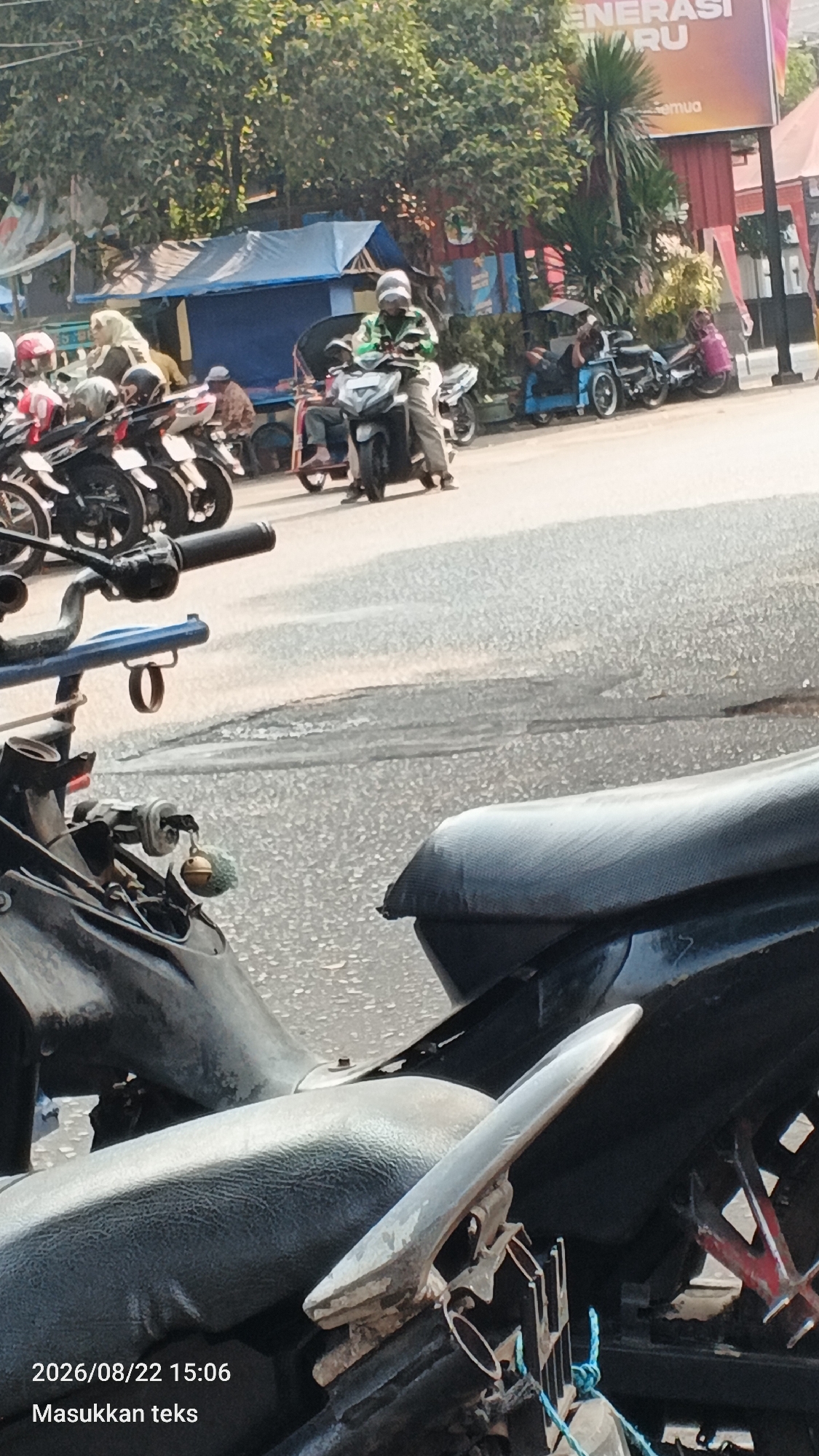 Street life and market bustle across central Malang