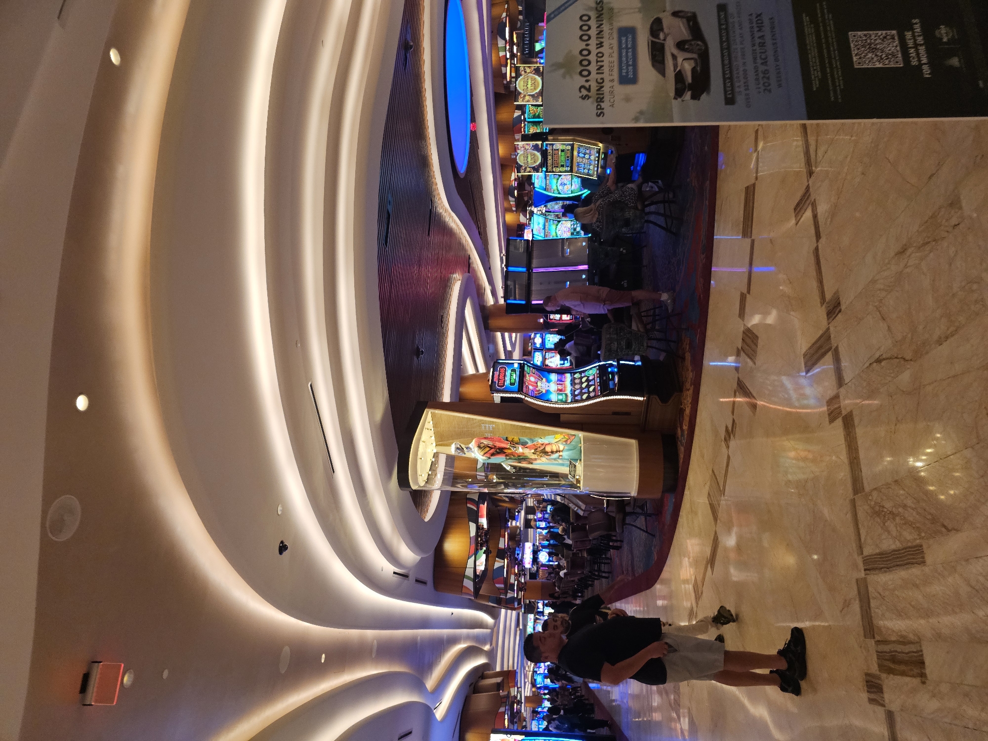 Late-night visitors document vintage clothing displays at Seminole casino