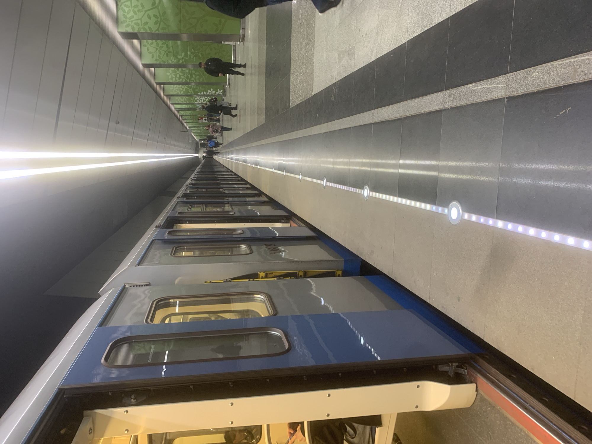 Moscow Metro train observed at platform with passengers aboard
