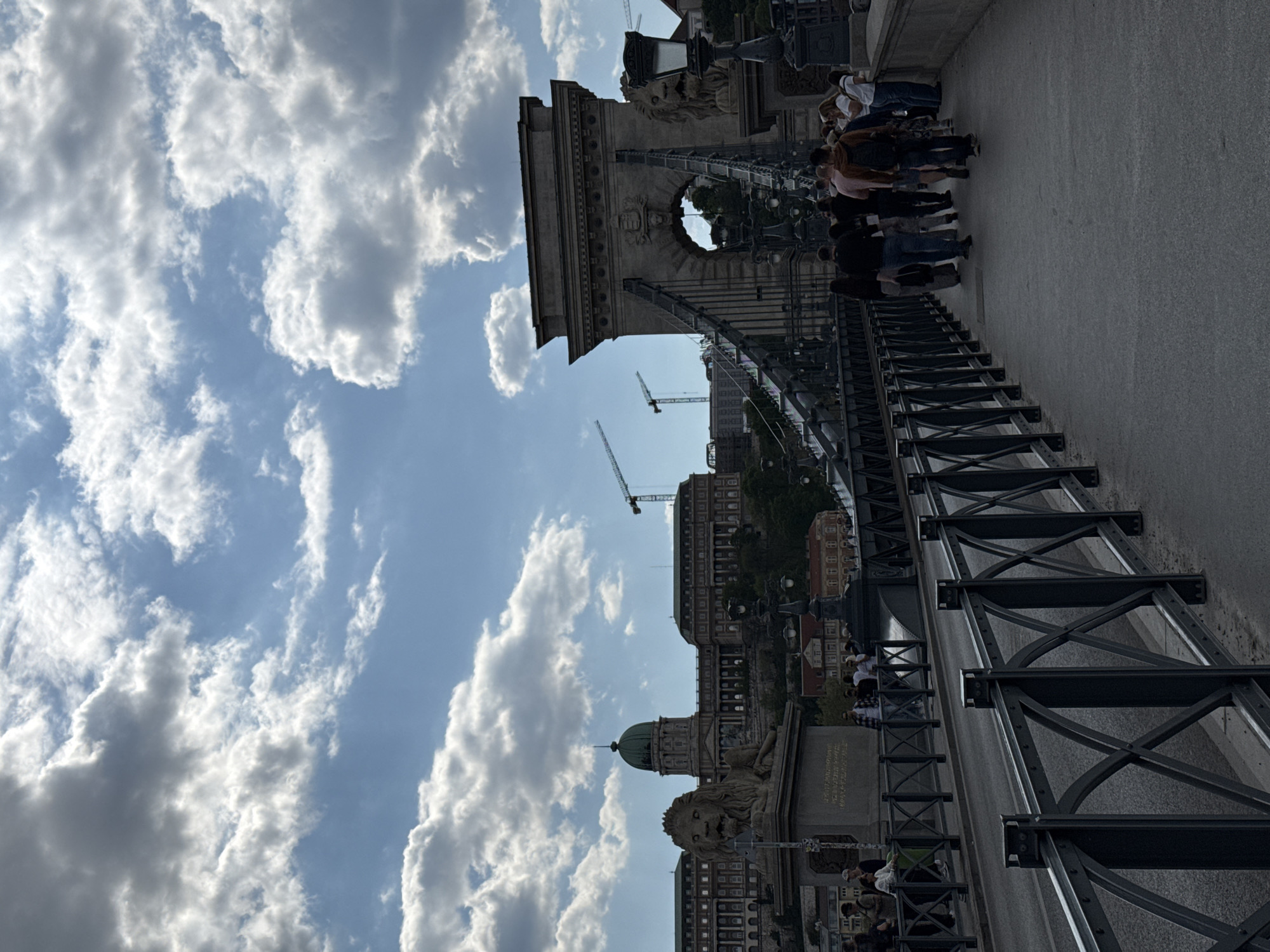 Tourist photographs document Budapest landmarks during afternoon sightseeing session