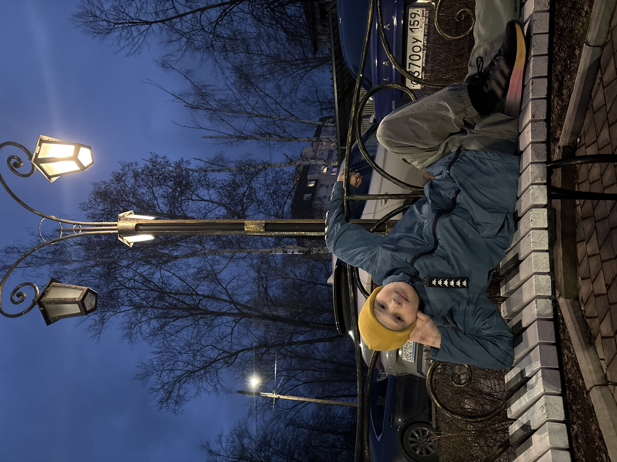 Child photographed during blue hour in Chaikovsky, Russia