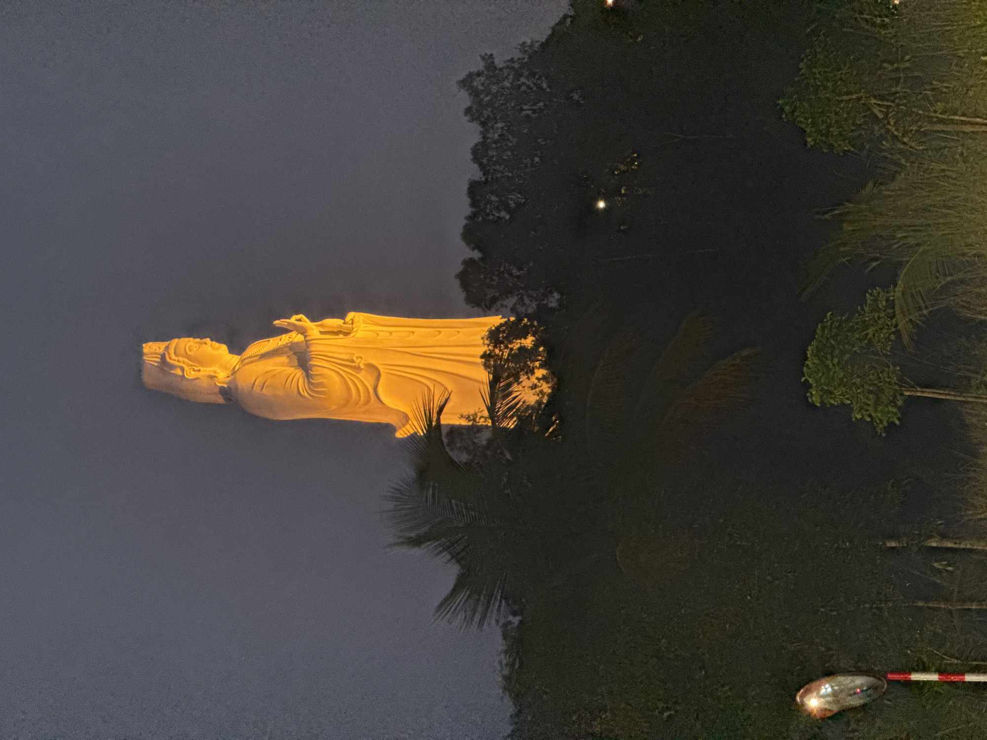 Nighttime views of illuminated Lady Buddha statue in Đà Nẵng