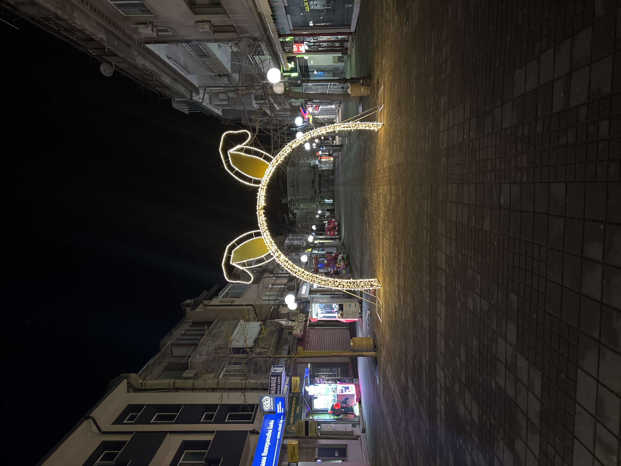 Illuminated bunny archway decorates pedestrian walkway in Pomorie