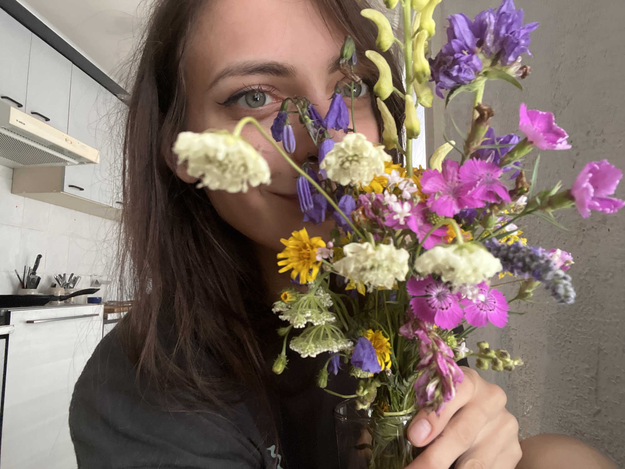 Wildflower bouquet held close, Krasnoyarsk