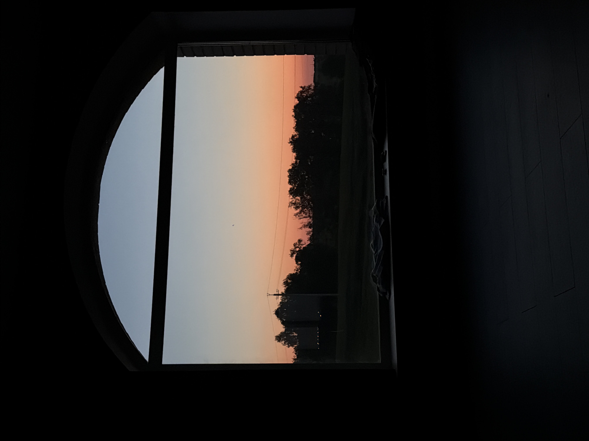 Twilight moment captured through arched window in Krasnoyarsk