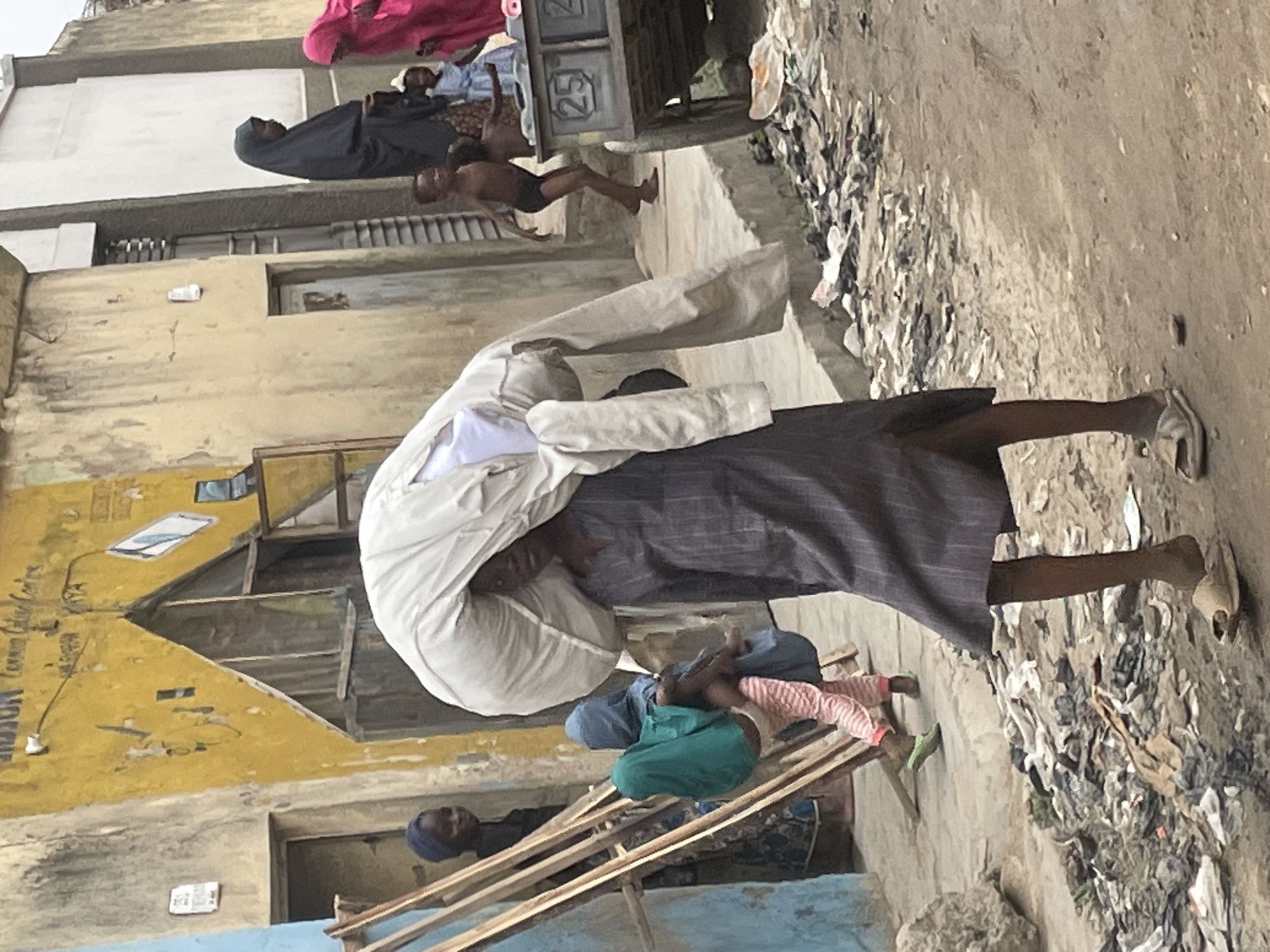 Daily street life captured across urban area afternoon
