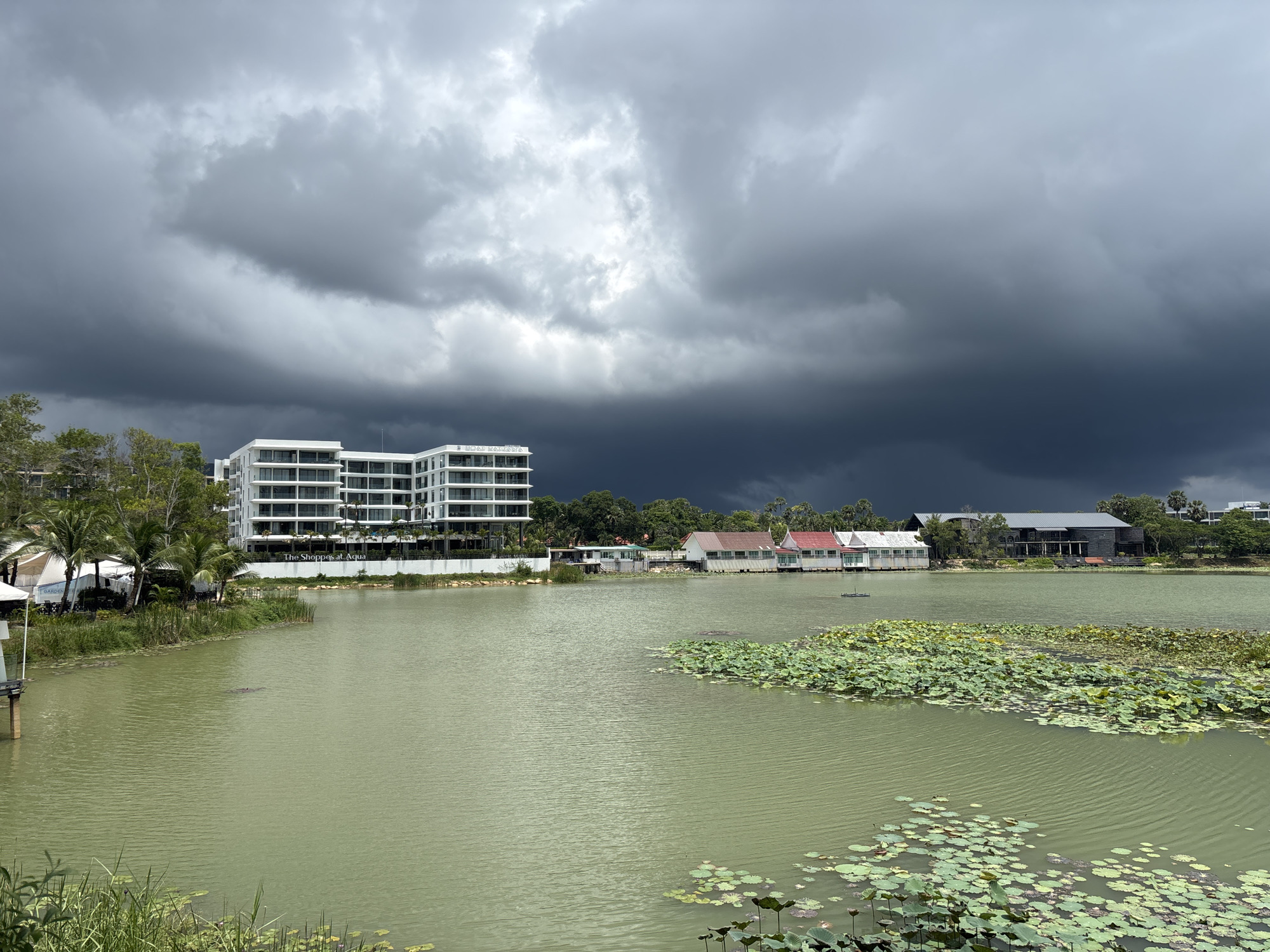 Stormy skies observed over lake in Choeng Thale, Thailand