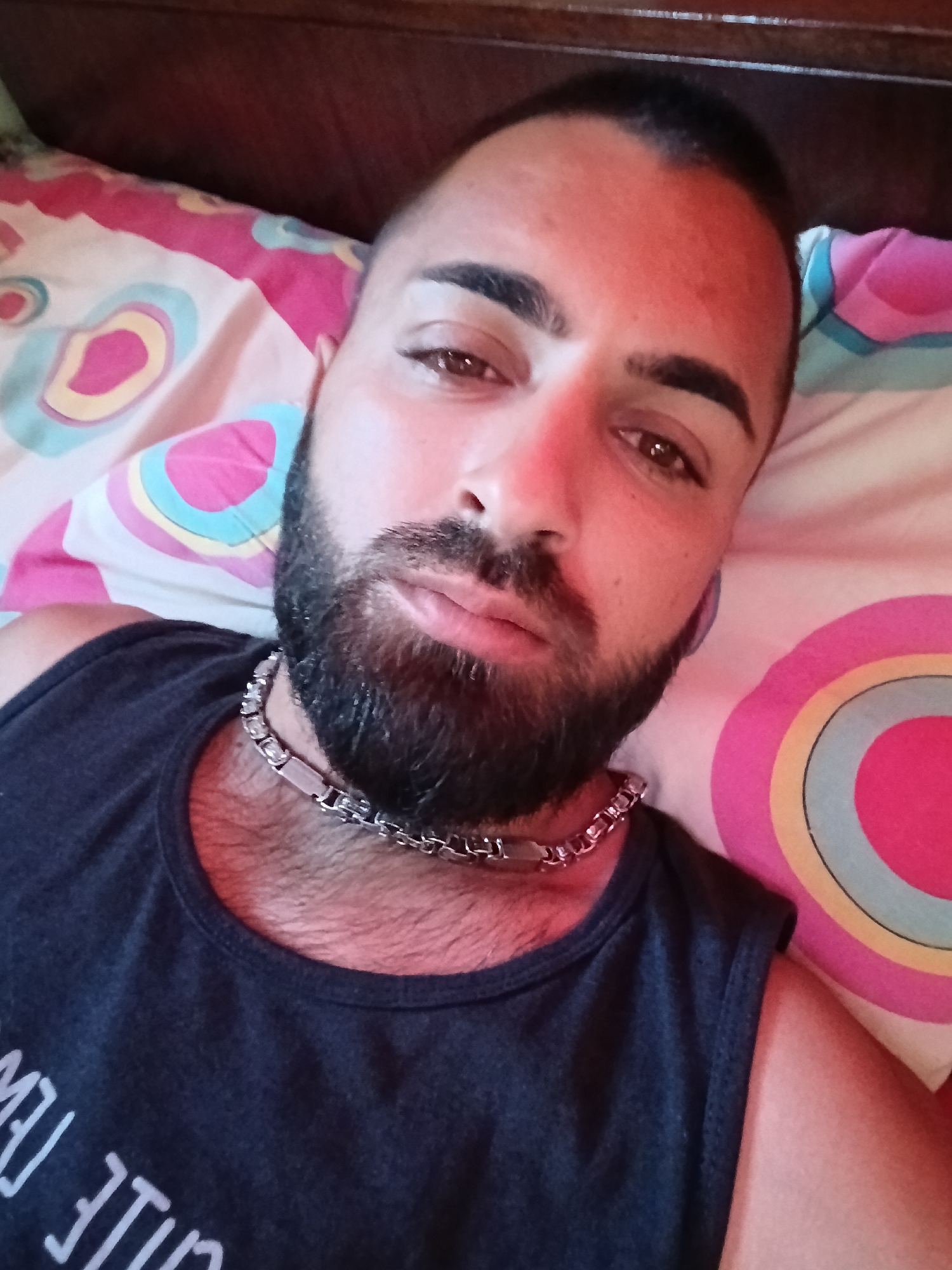 Man rests on bed in Greek municipality
