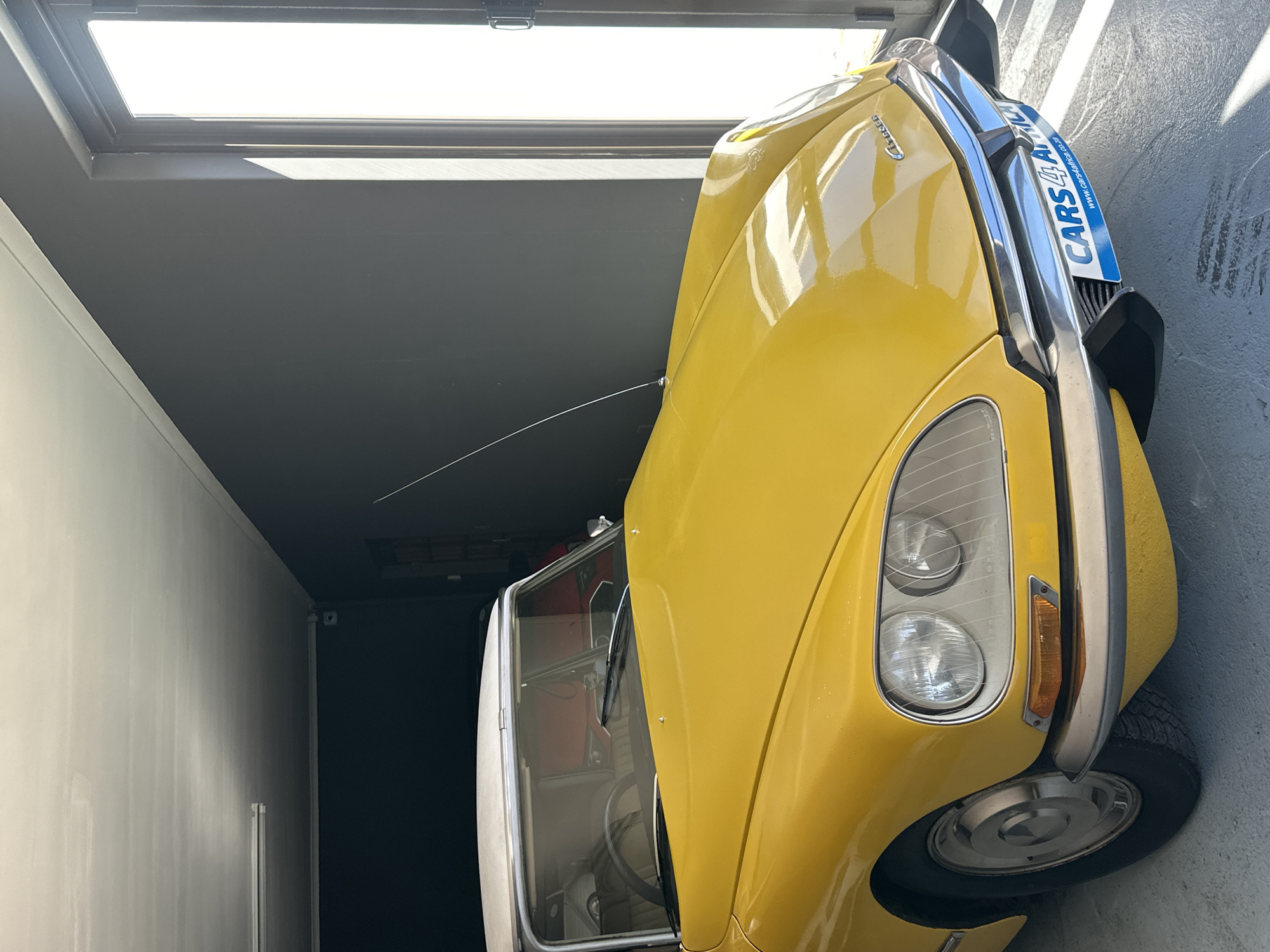Vintage car garage activity documented in Cape Town