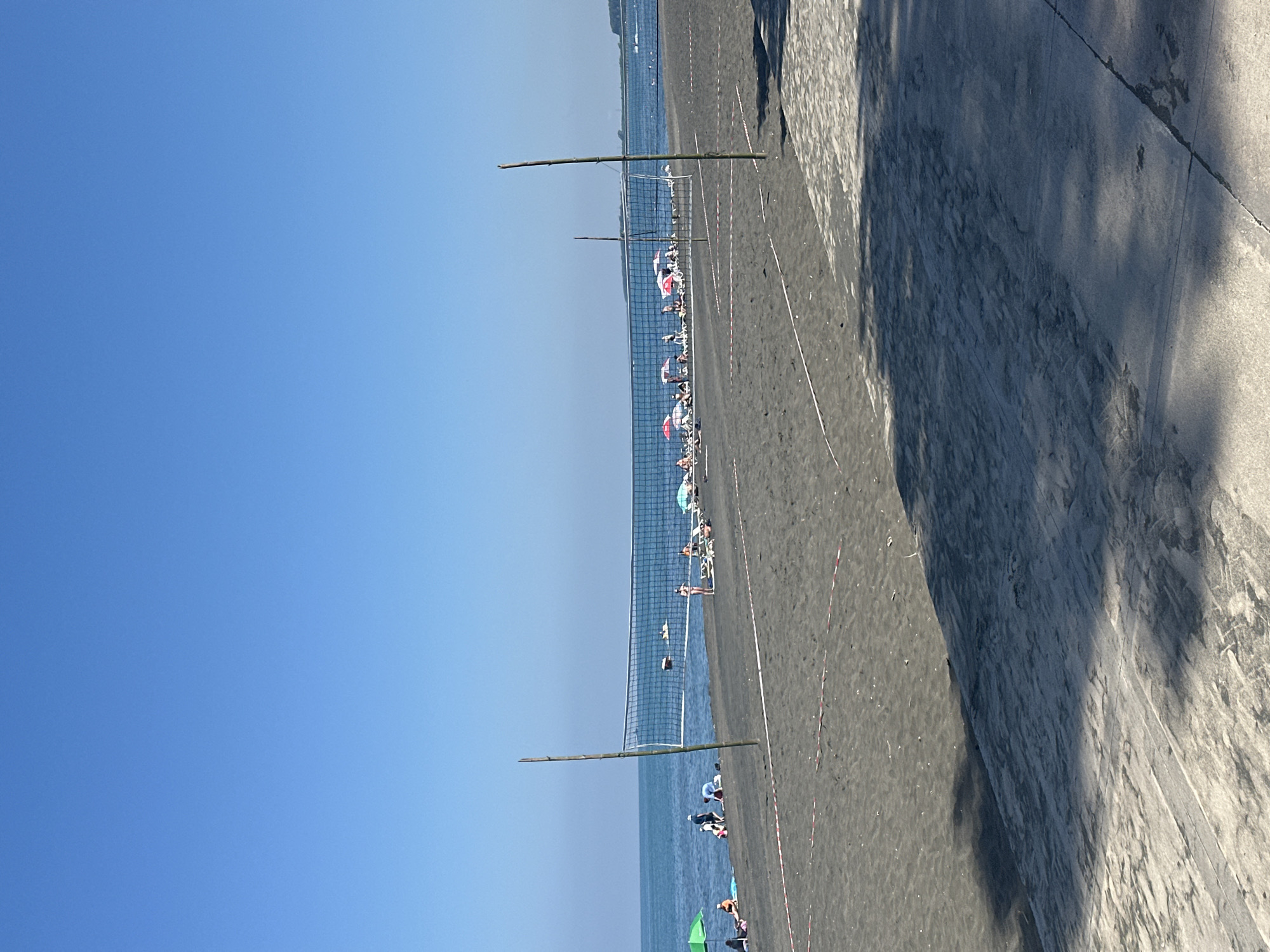 Ureki's black sand beach, quiet and a little rough around the edges