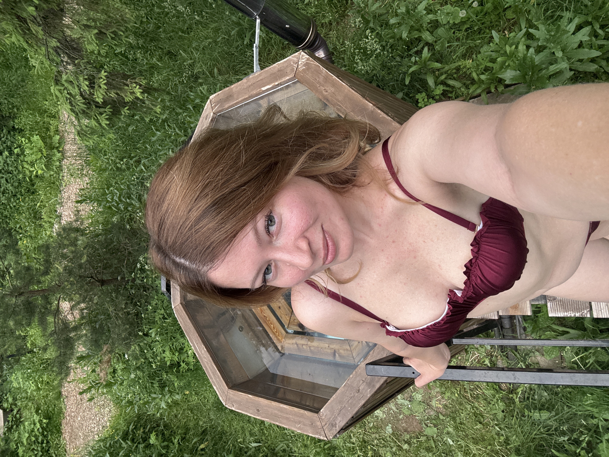 Women enjoy hot tub facility in Russian forest setting