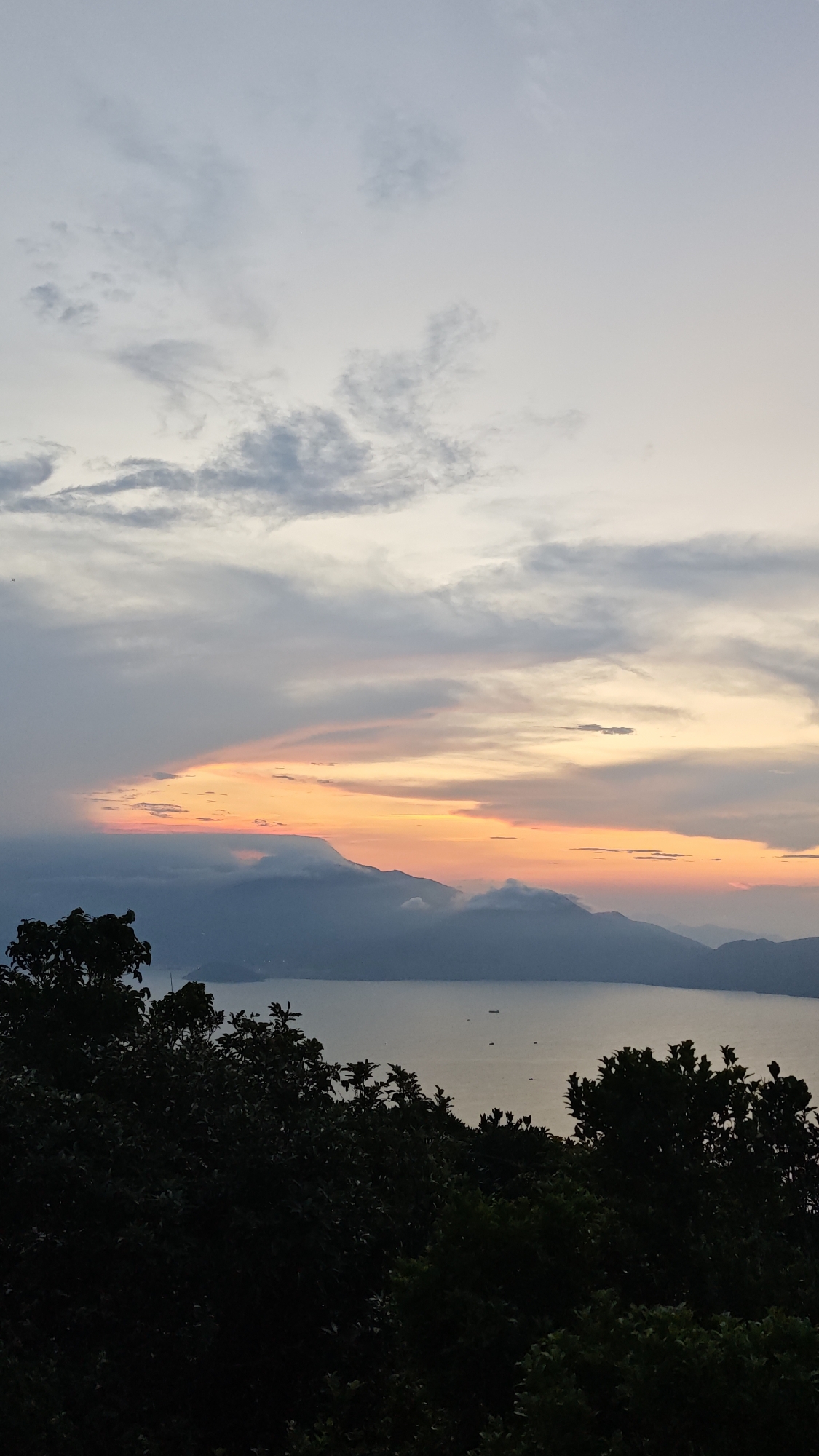 Sunrise landscape captured over water body in Đà Nẵng