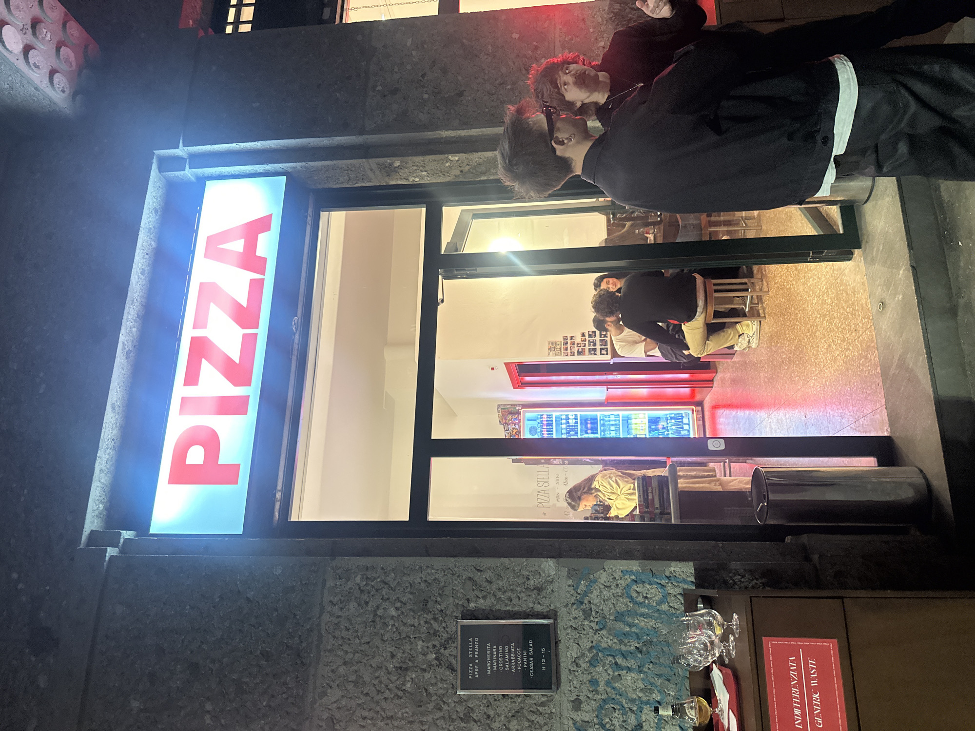Man spotted outside Pizza Stella pizzeria in Milan