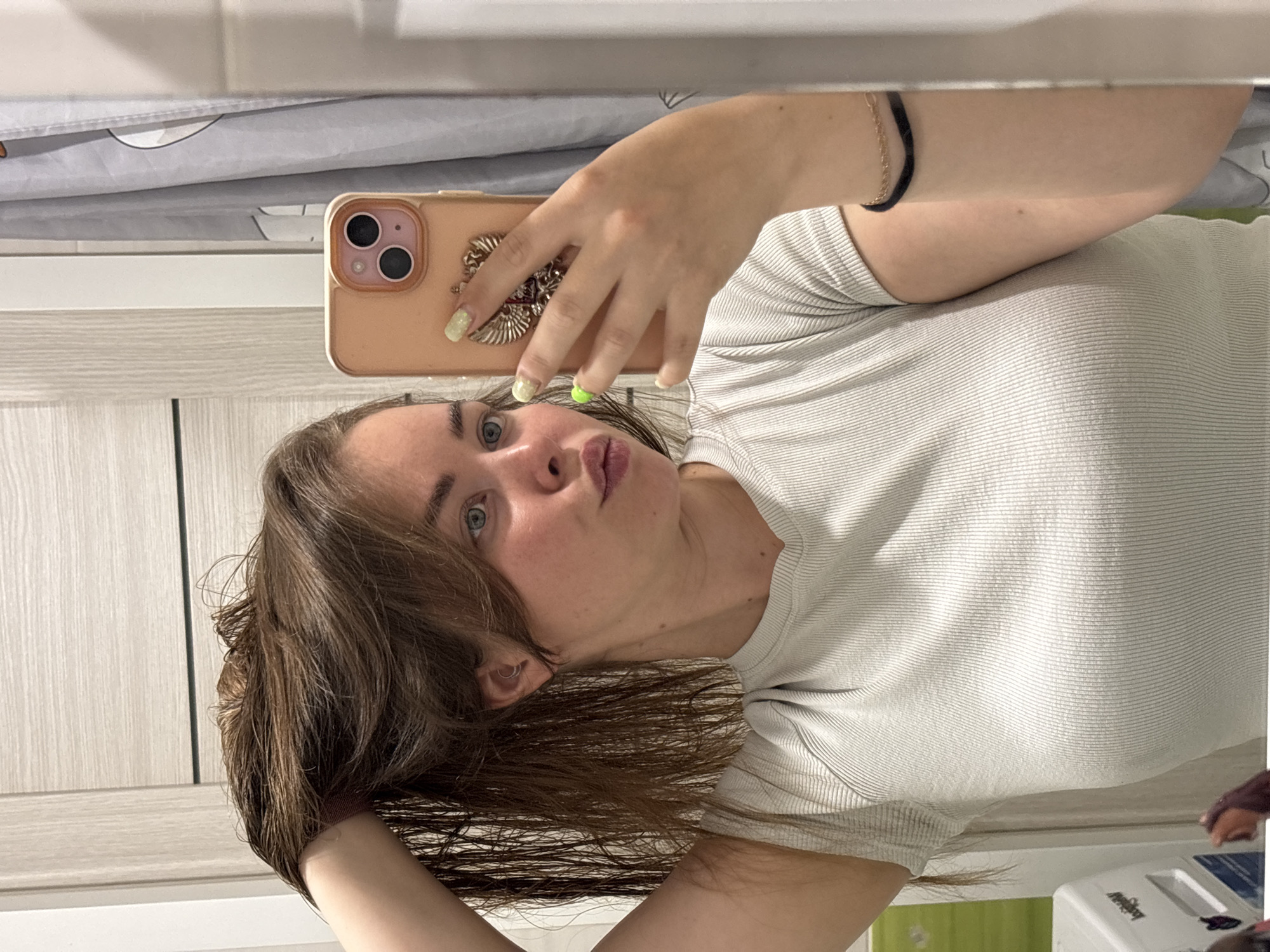 Woman takes early morning selfies in Izhevsk apartment