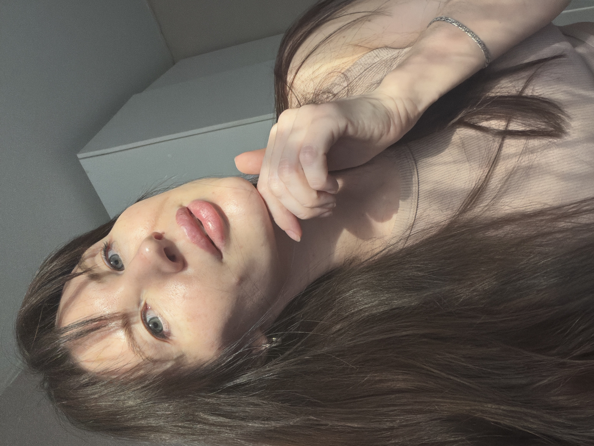 Woman photographed in casual indoor moments in Perm