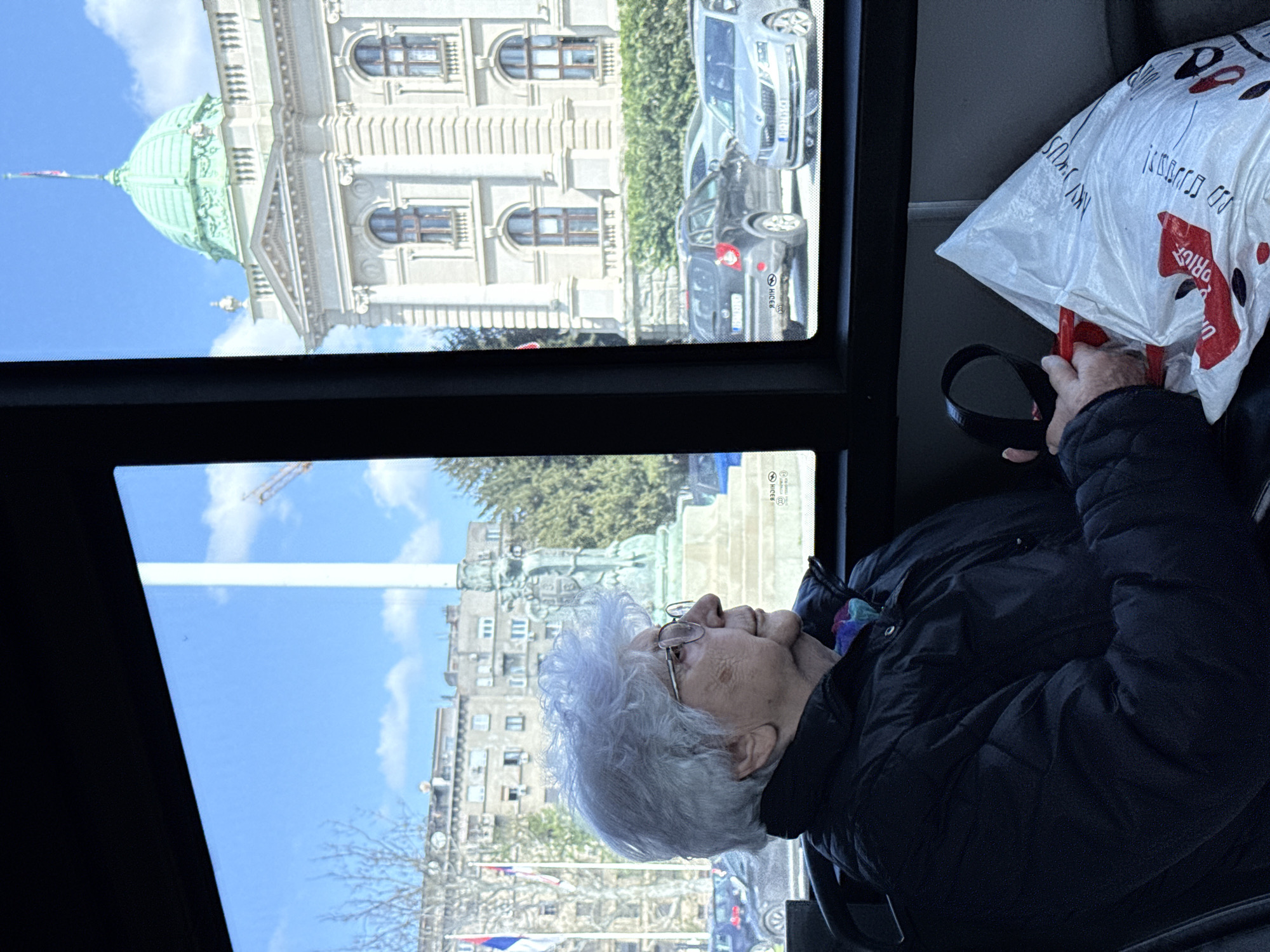 Elderly woman observed on Belgrade public transport