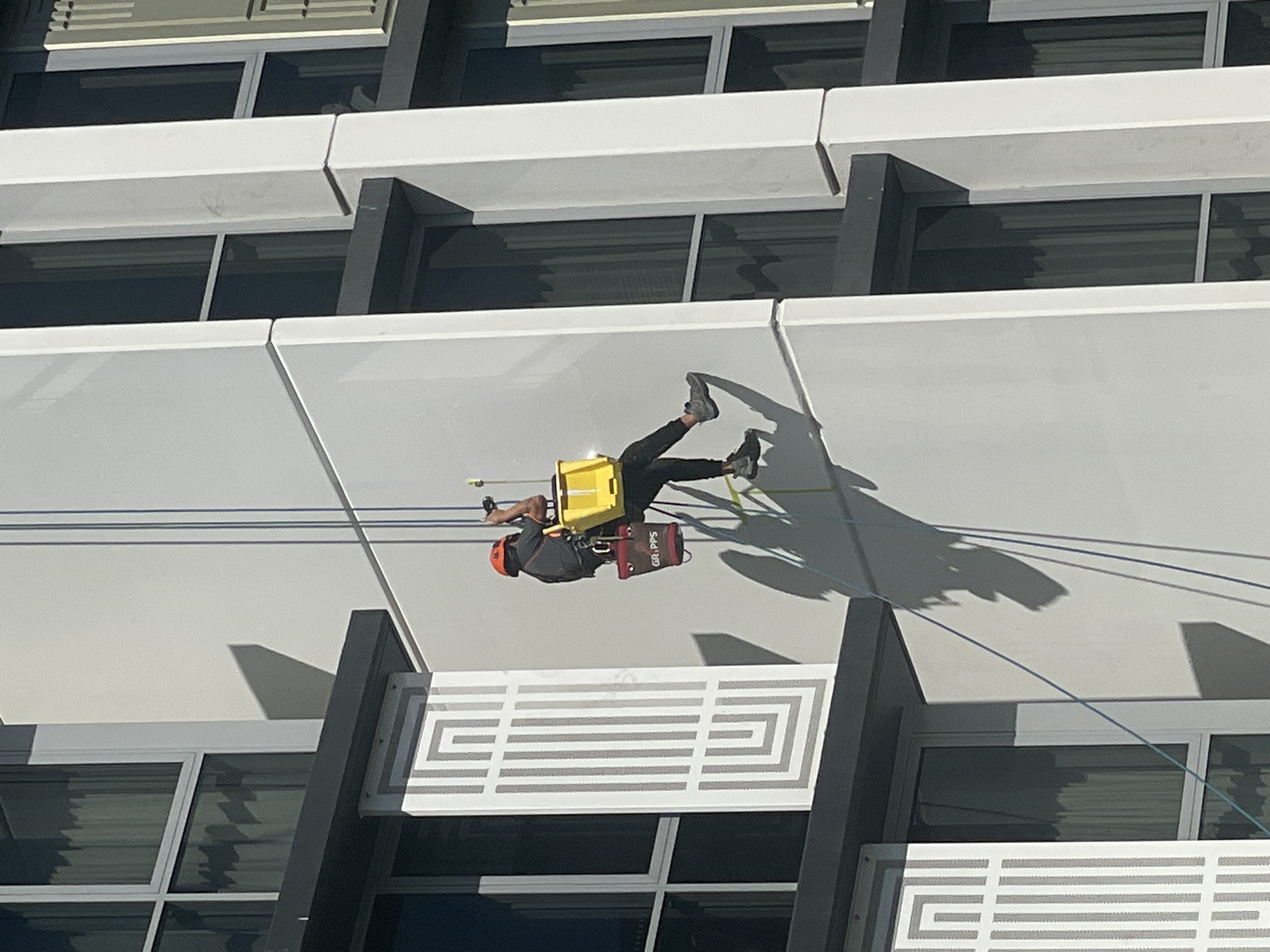 Building rappel and street scene from a sunny Brisbane morning