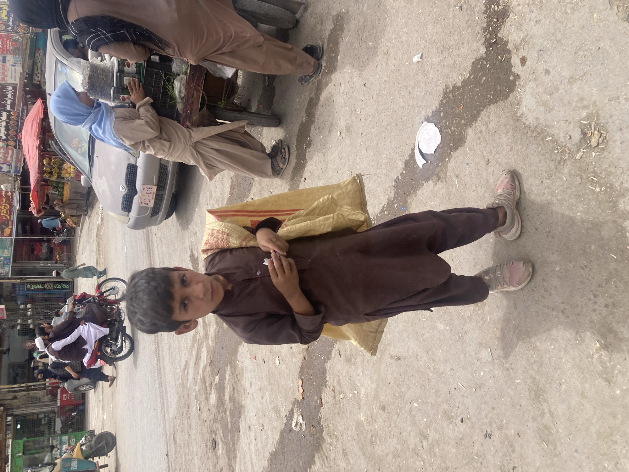 Morning street life documented in Pakistani towns