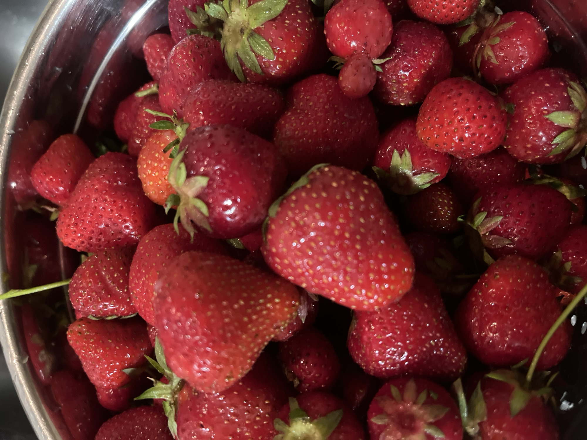 Summer evening scenes: fresh strawberries and child's scooter ride
