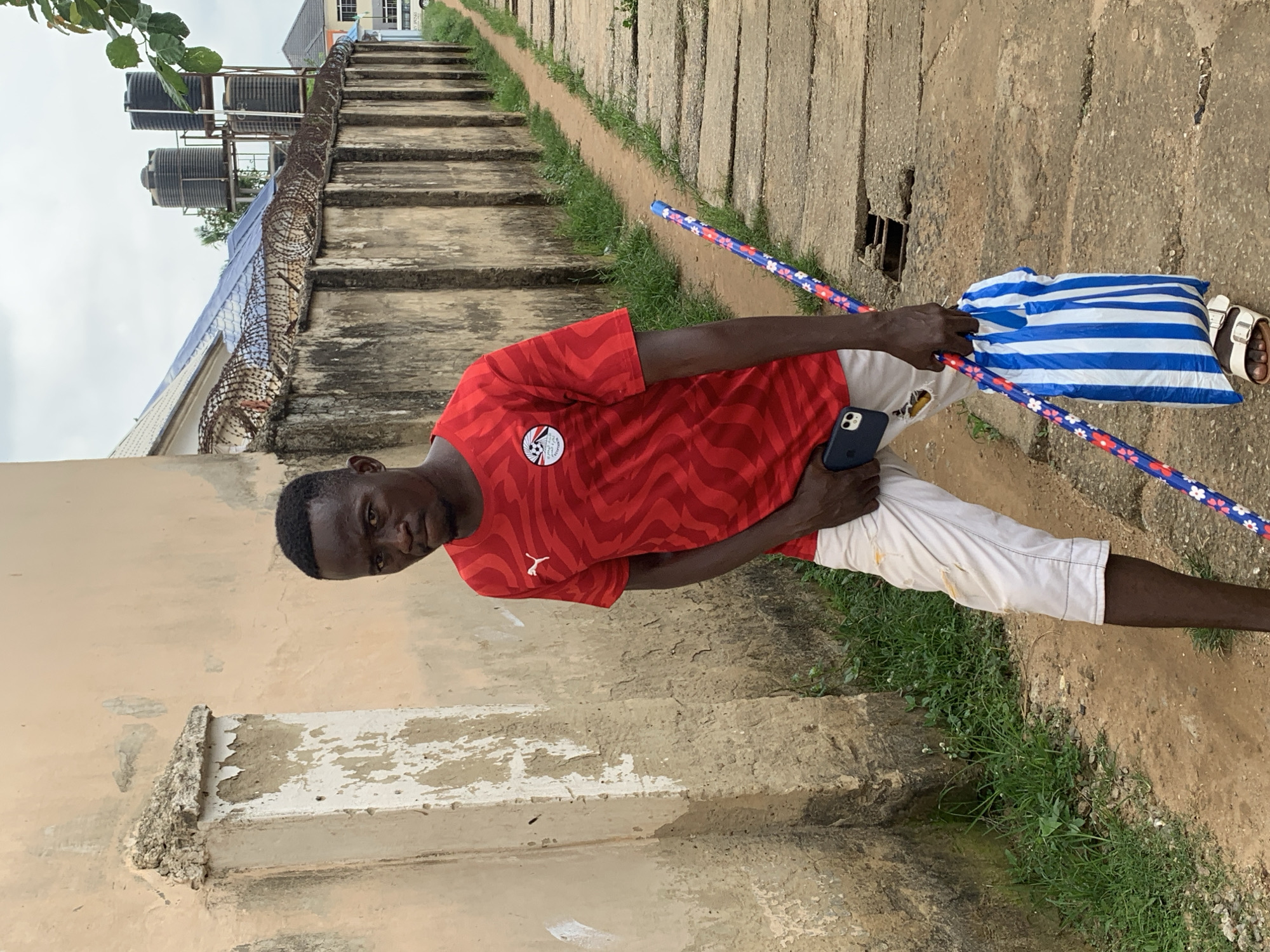 Afternoon street life in a residential Abuja neighborhood