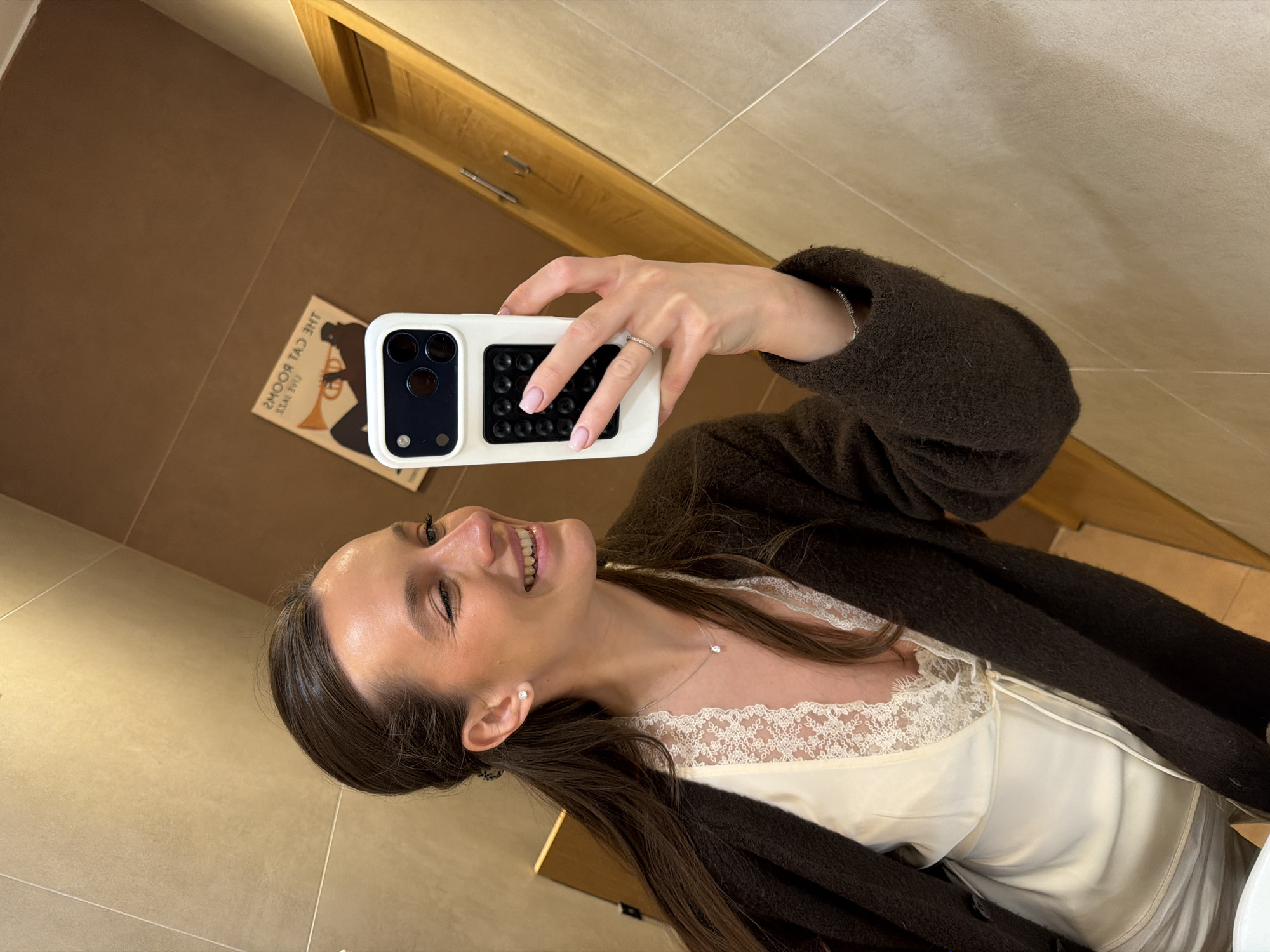 Woman takes selfies in bathroom and restaurant in Tivat