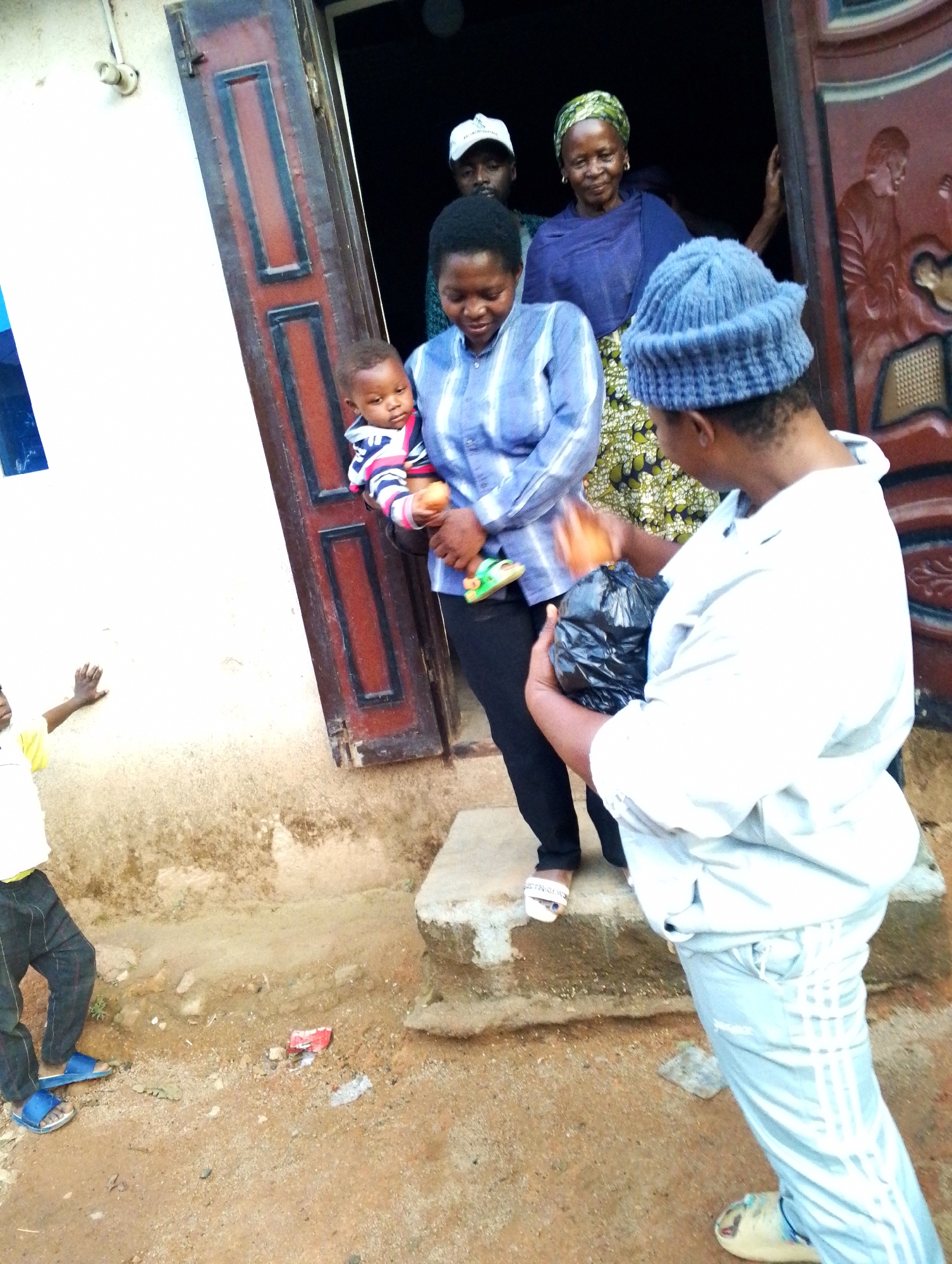 Everyday community life documented in Jos, Nigeria neighborhood