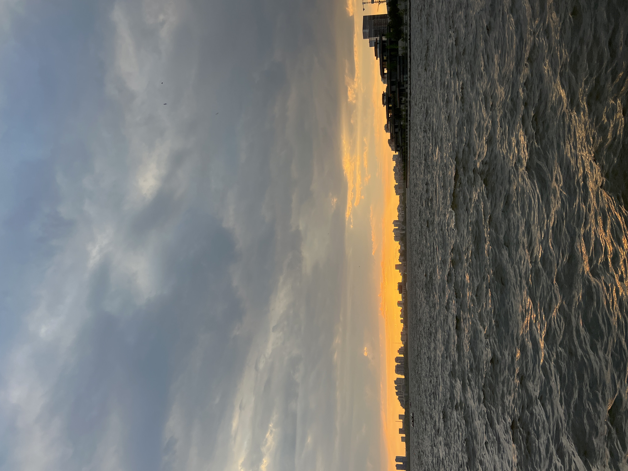 Kazan scenes captured: boats, motorcycle, sunset views across city