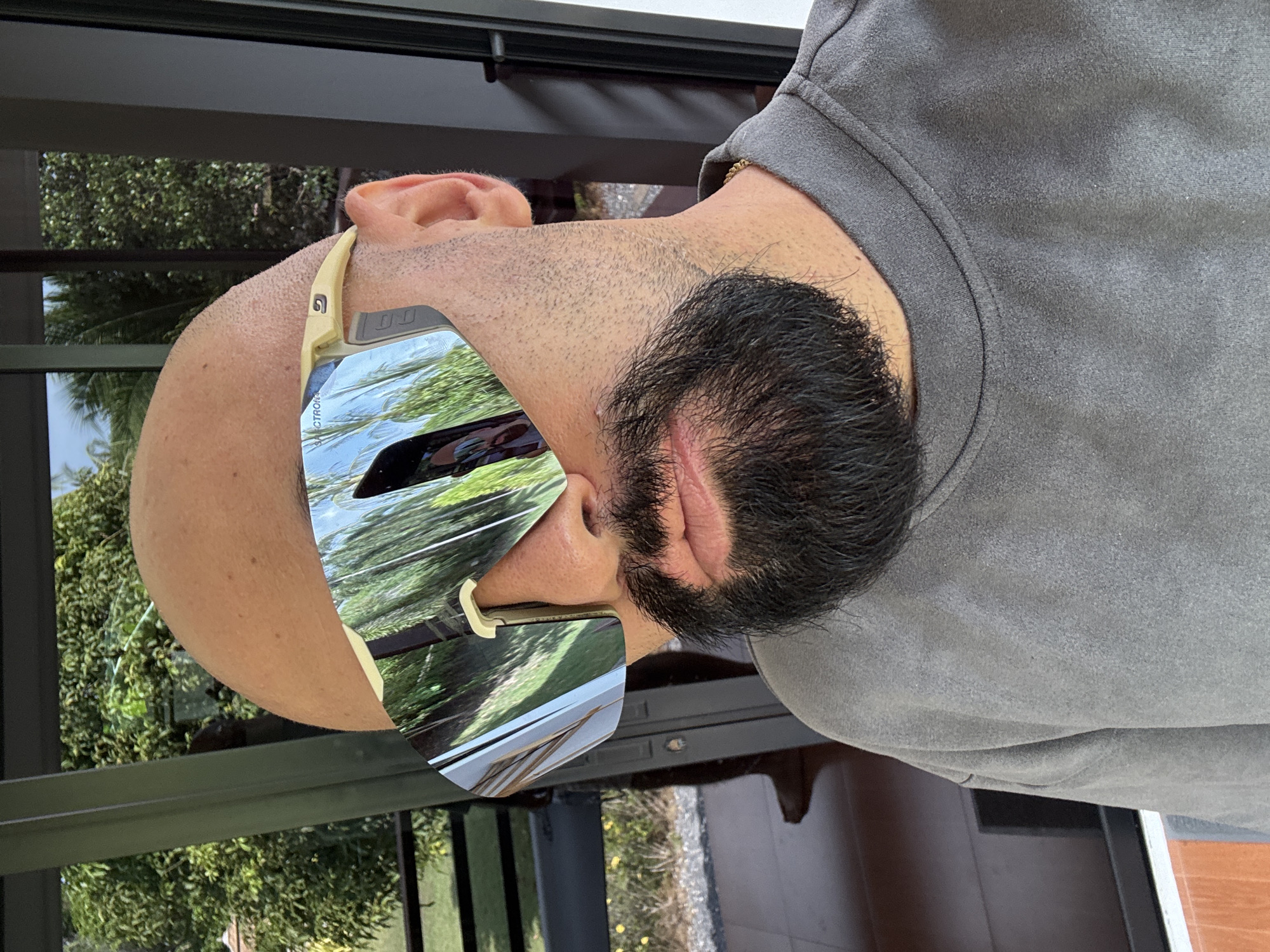 Sunglasses try-on session on a Ko Samui balcony