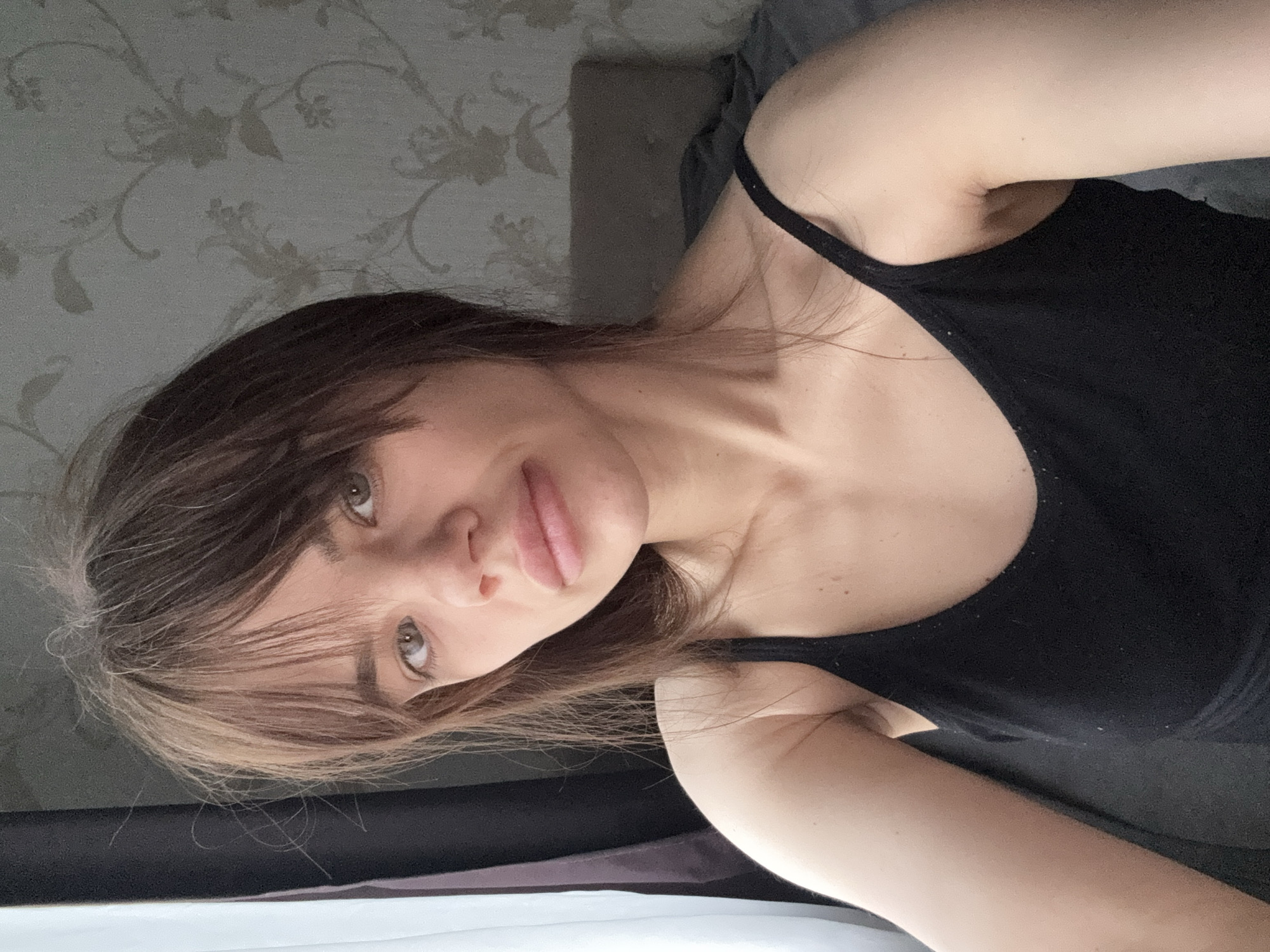 Woman takes morning selfies in Rostov-on-Don apartment