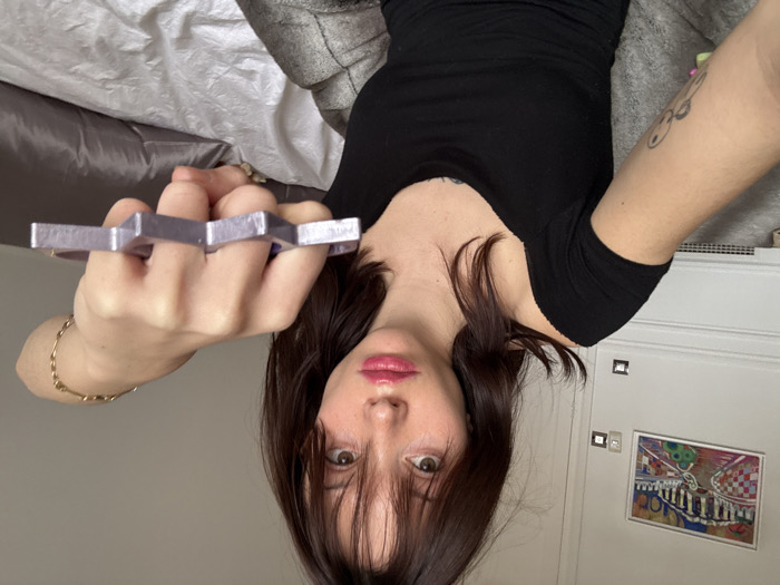 Young woman photographed in indoor selfie in Barcelona