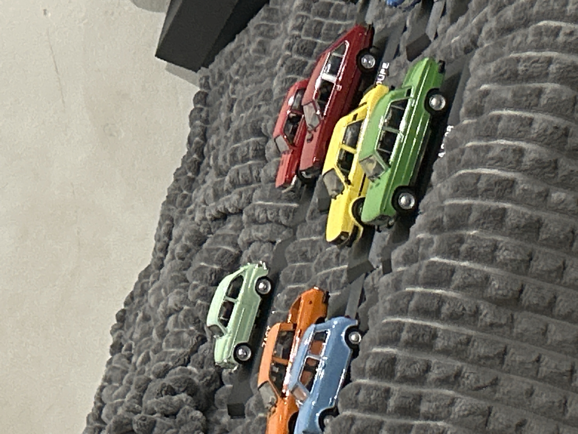 Witness captures home decor: toy cars, wolf painting