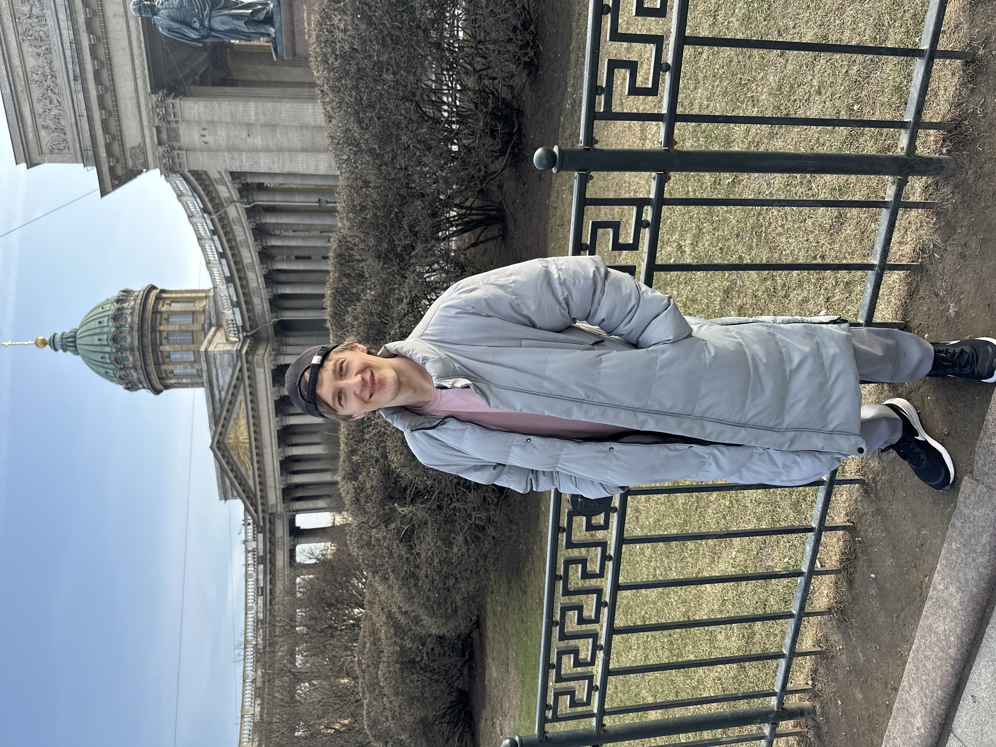 Tourists photograph themselves at Saint Petersburg's Kazan Cathedral
