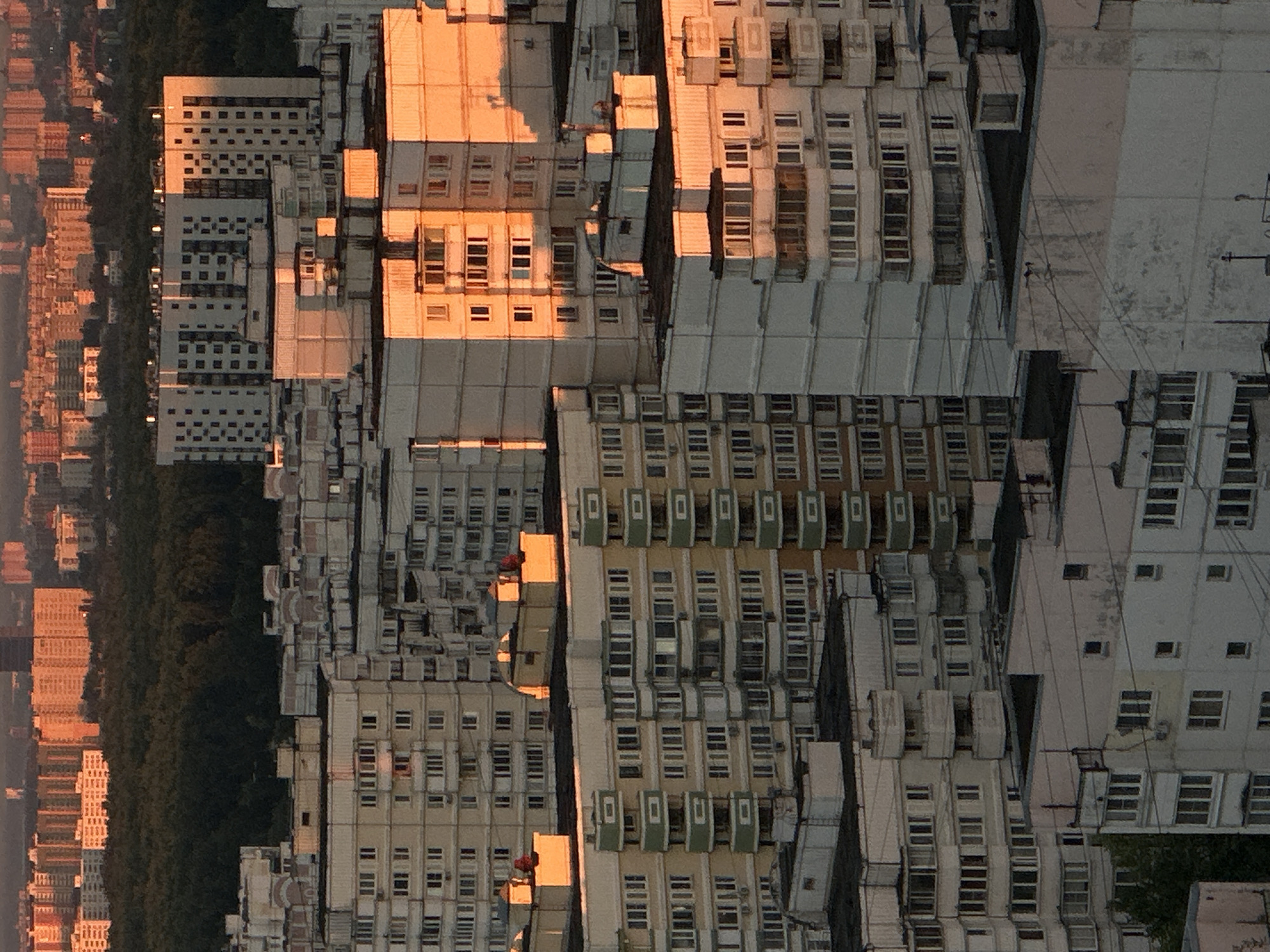 Moscow apartment blocks photographed from multiple angles at sunset