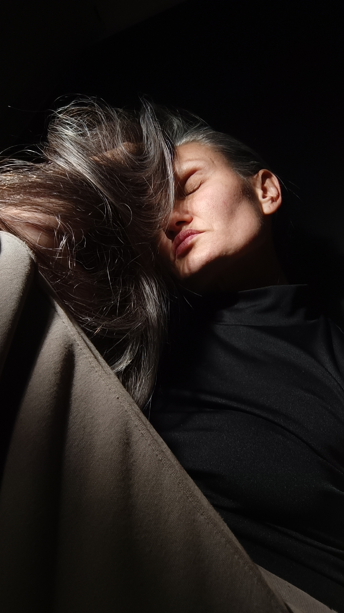 Portrait session captured in dramatic lighting in Lermontov, Russia