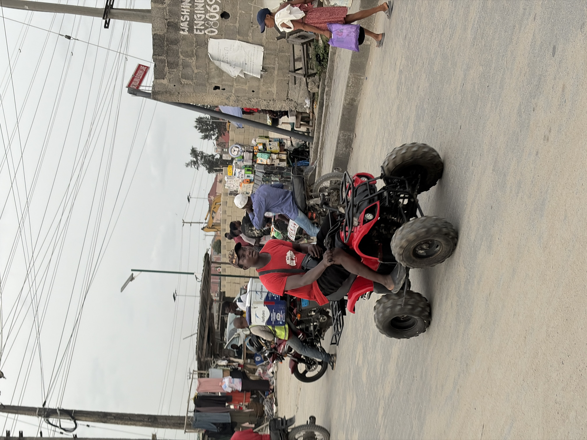 Urban street life documented in Nigerian towns Thursday evening