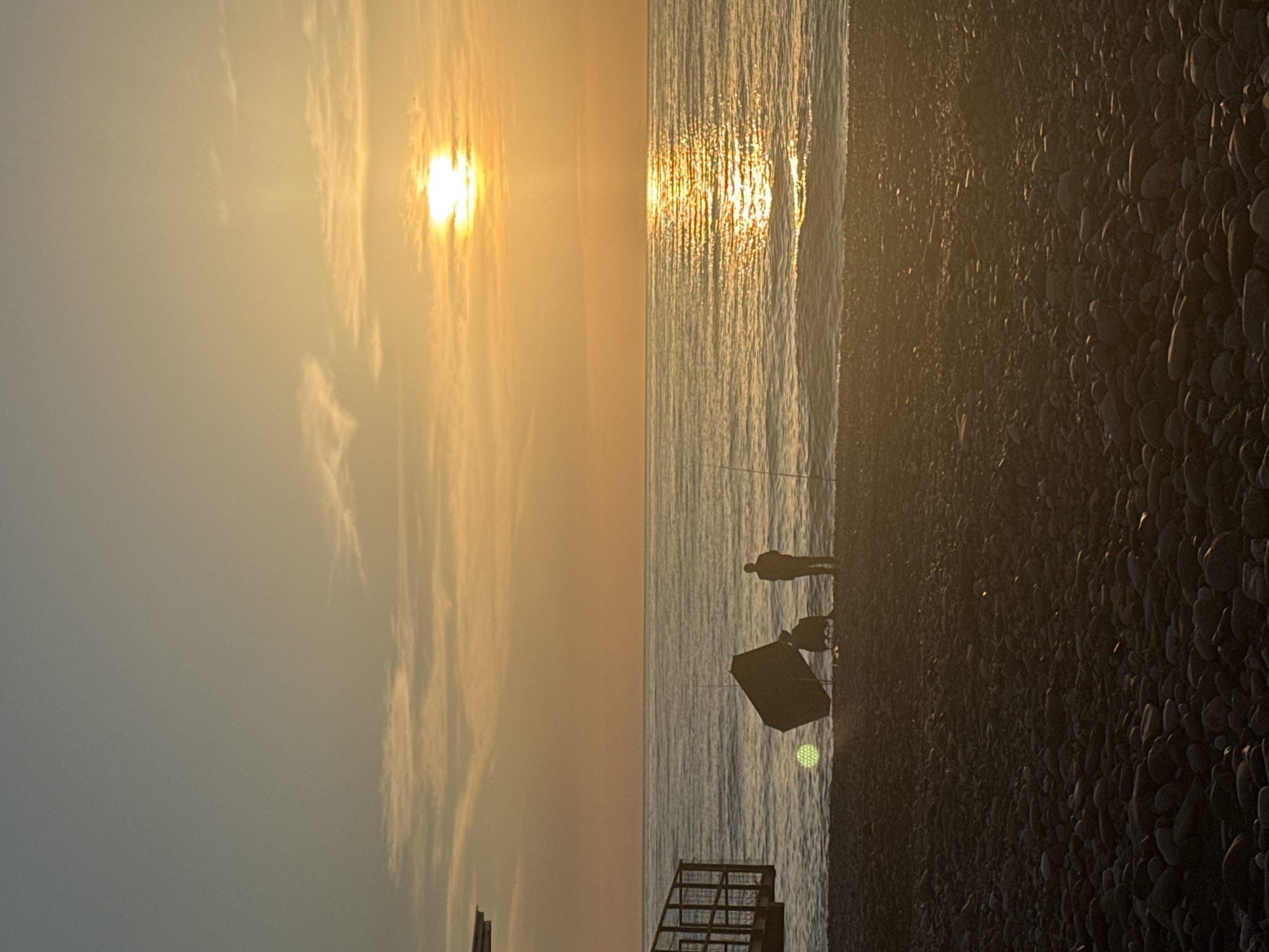 Sunset documented over Black Sea beach in Batumi, Georgia