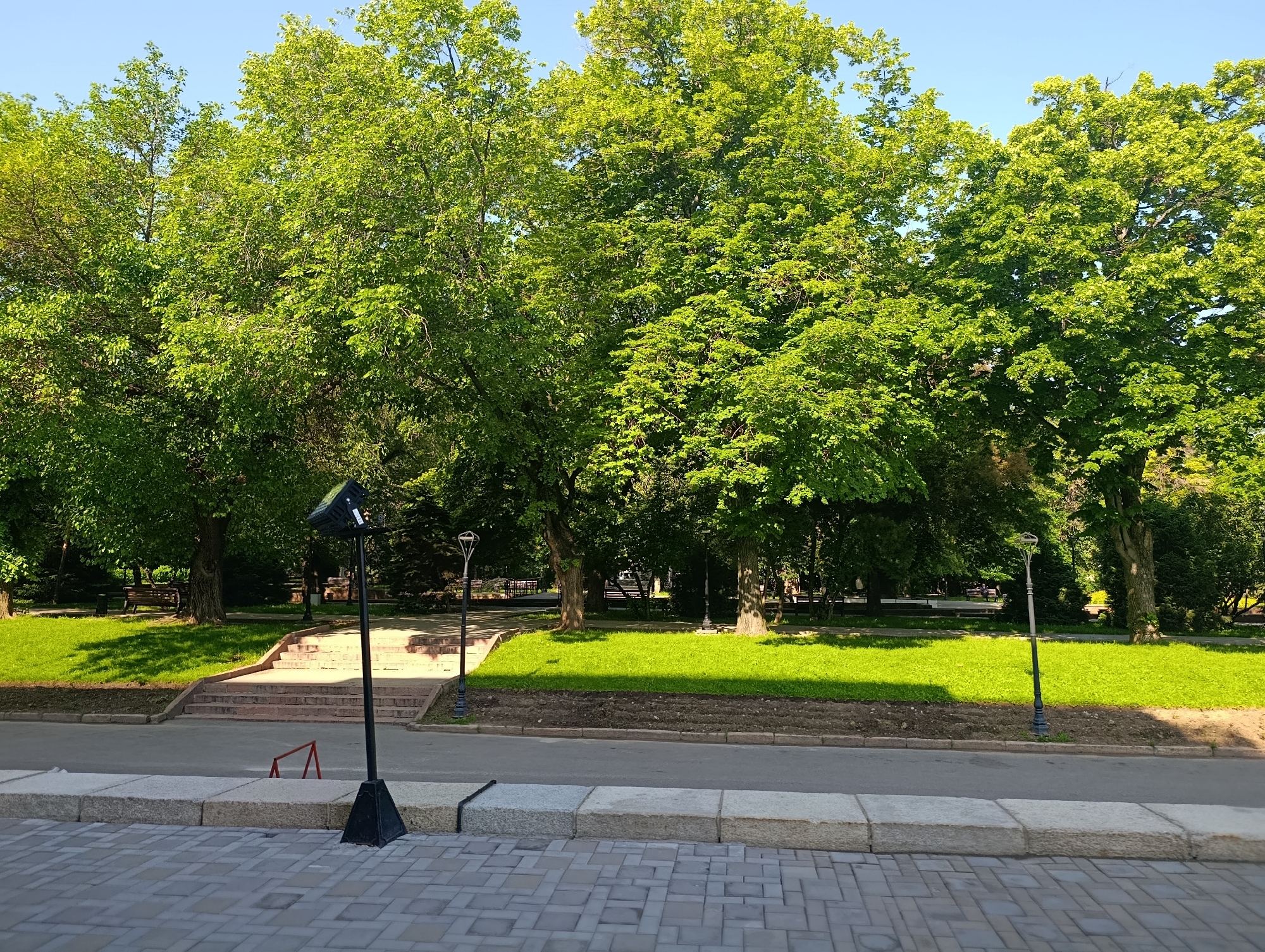 Early morning observations document Almaty fountains, monuments, streetscapes