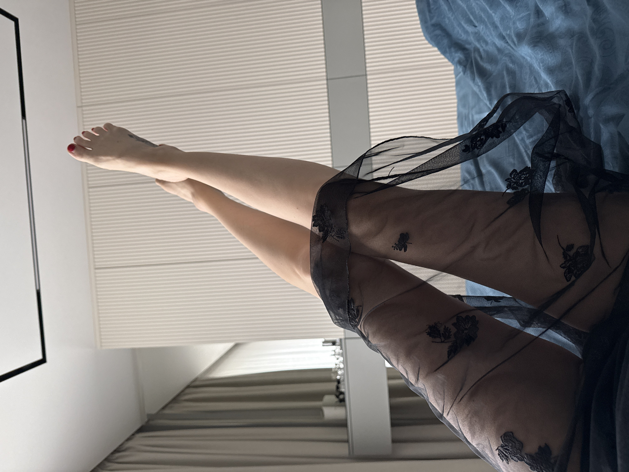 Woman observed in bedroom setting in Khimki, Russia